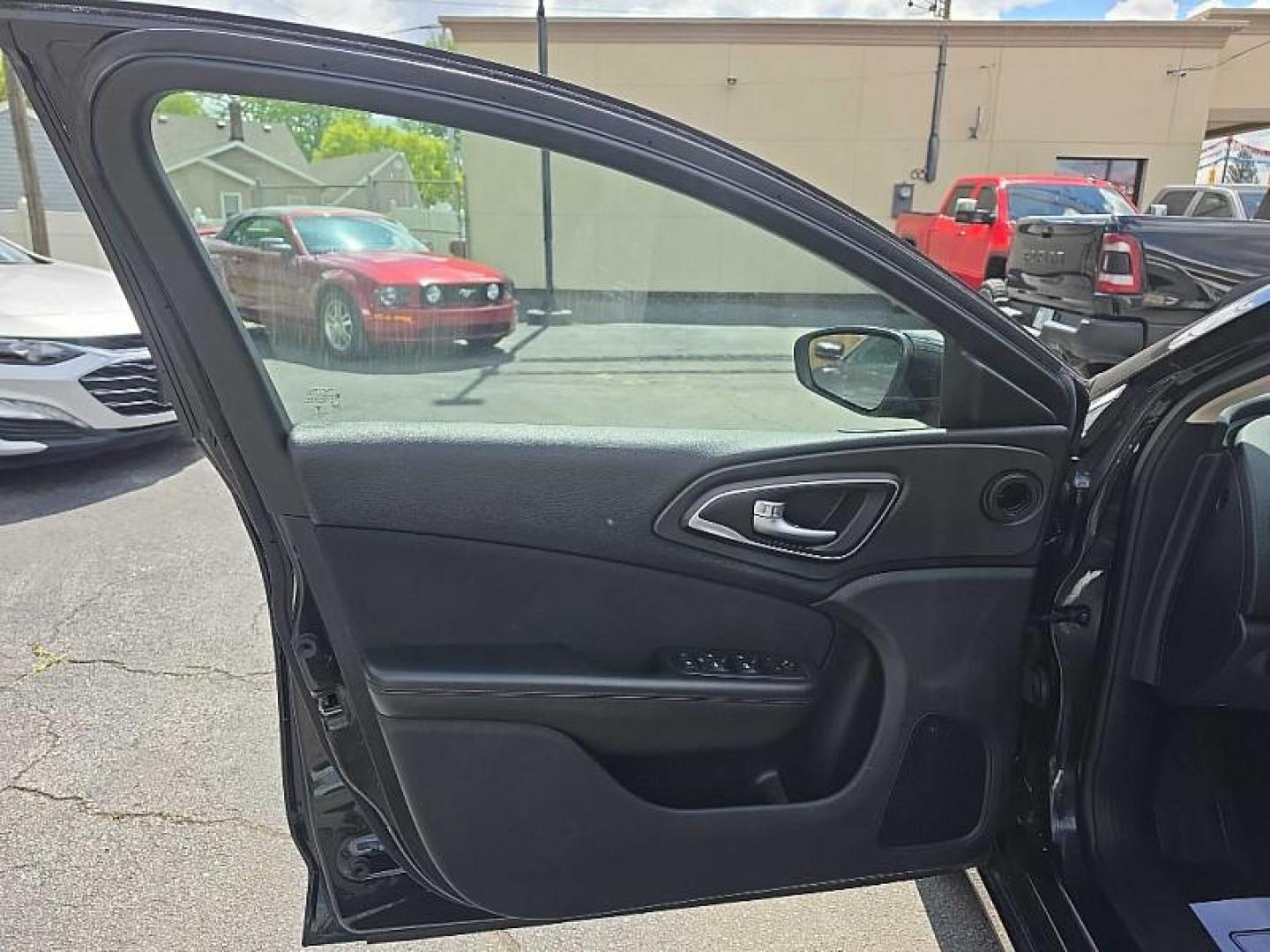 2016 BLACK /BLACK Chrysler 200 LX (1C3CCCFB8GN) with an 2.4L L4 DOHC 16V engine, 9A transmission, located at 3304 Woodville Road, Northwood, OH, 43619, (419) 210-8019, 41.612694, -83.480743 - Your #1 Destination for Auto Loans and mdash;No Matter Your Credit!At our dealership, we believe everyone deserves the opportunity to drive their dream car and mdash;whether you have good credit, bad credit, or no credit at all. With a wide selection of hundreds of cars, trucks, and SUVs, you'll fin - Photo#8