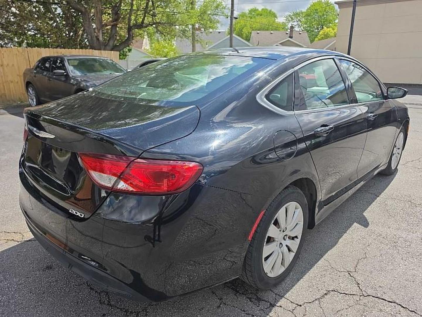 2016 BLACK /BLACK Chrysler 200 LX (1C3CCCFB8GN) with an 2.4L L4 DOHC 16V engine, 9A transmission, located at 3304 Woodville Road, Northwood, OH, 43619, (419) 210-8019, 41.612694, -83.480743 - Your #1 Destination for Auto Loans and mdash;No Matter Your Credit!At our dealership, we believe everyone deserves the opportunity to drive their dream car and mdash;whether you have good credit, bad credit, or no credit at all. With a wide selection of hundreds of cars, trucks, and SUVs, you'll fin - Photo#1