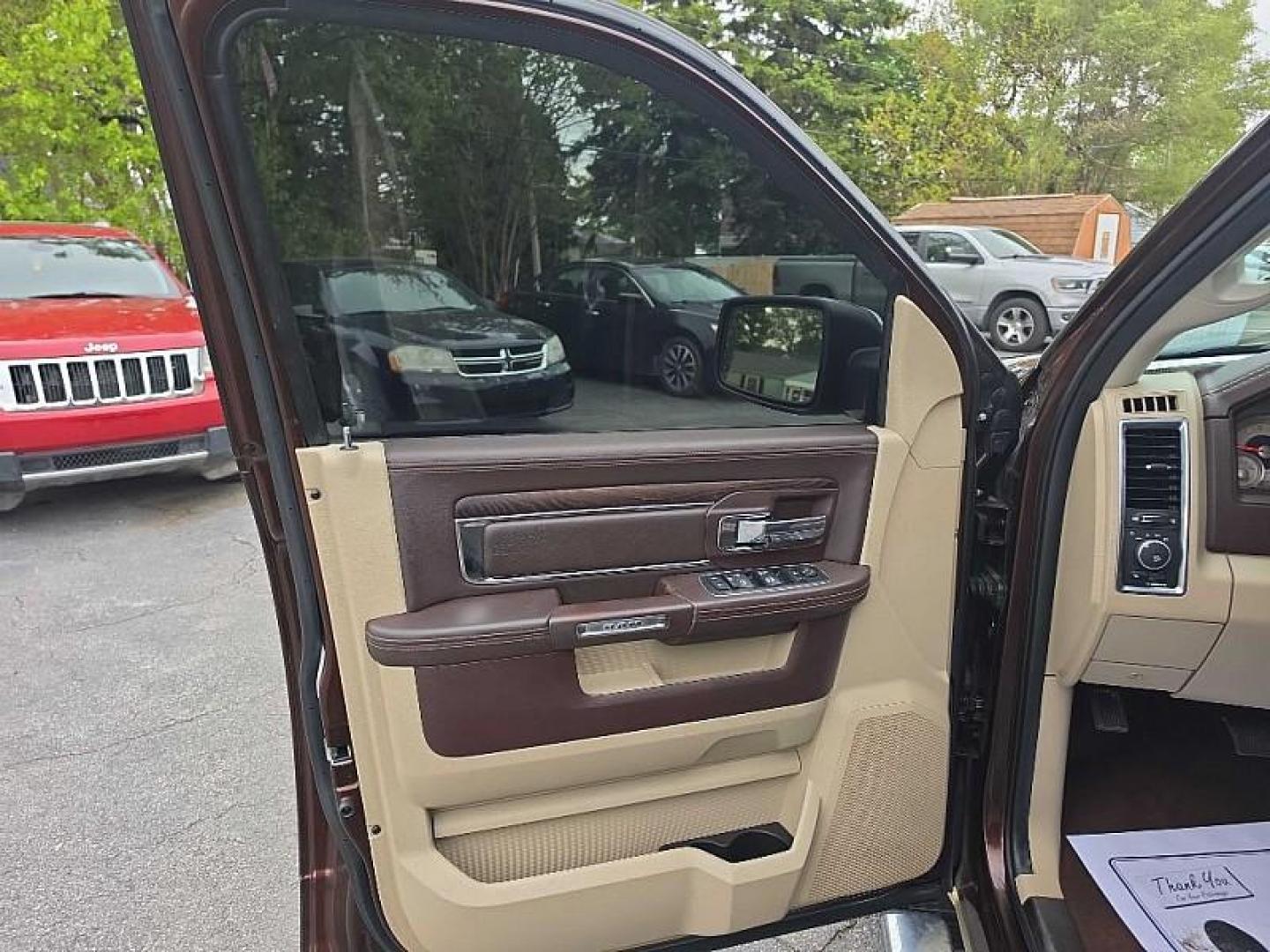 2014 BROWN /TAN RAM 1500 Laramie Longhorn Edition Crew Cab LWB 4WD (1C6RR7WM6ES) with an 3.0L V6 DIESEL engine, 6-Speed Automatic transmission, located at 3304 Woodville Road, Northwood, OH, 43619, (419) 210-8019, 41.612694, -83.480743 - Your #1 Destination for Auto Loans and mdash;No Matter Your Credit!At our dealership, we believe everyone deserves the opportunity to drive their dream car and mdash;whether you have good credit, bad credit, or no credit at all. With a wide selection of hundreds of cars, trucks, and SUVs, you'll fin - Photo#8