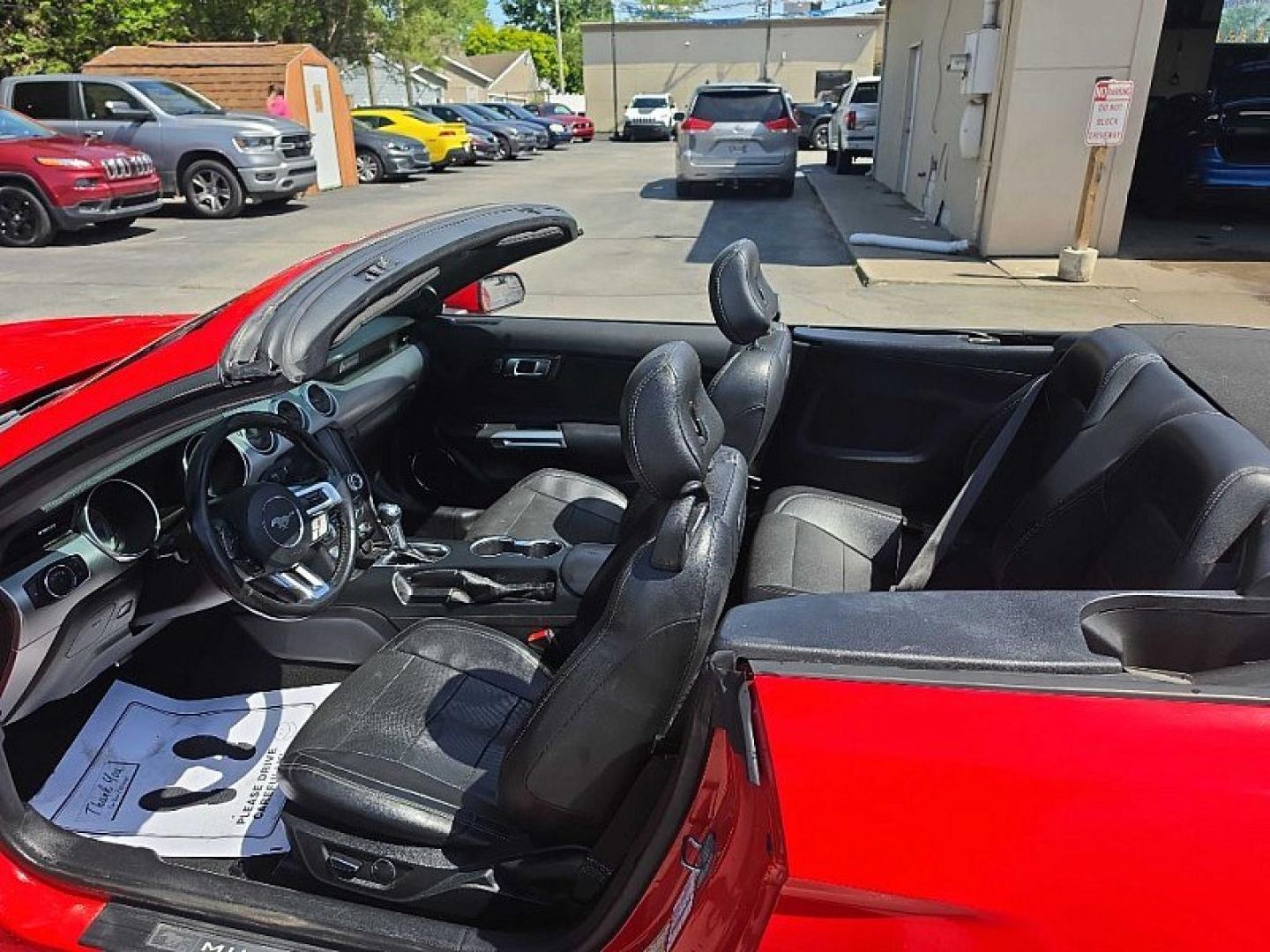 2019 RED /BLACK Ford Mustang EcoBoost Premium Convertible (1FATP8UH8K5) with an 2.3L L4 DOHC 16V engine, Automatic 10-Spd w/SelectShift transmission, located at 3304 Woodville Road, Northwood, OH, 43619, (419) 210-8019, 41.612694, -83.480743 - Your #1 Destination for Auto Loans and mdash;No Matter Your Credit!At our dealership, we believe everyone deserves the opportunity to drive their dream car and mdash;whether you have good credit, bad credit, or no credit at all. With a wide selection of hundreds of cars, trucks, and SUVs, you'll fin - Photo#15