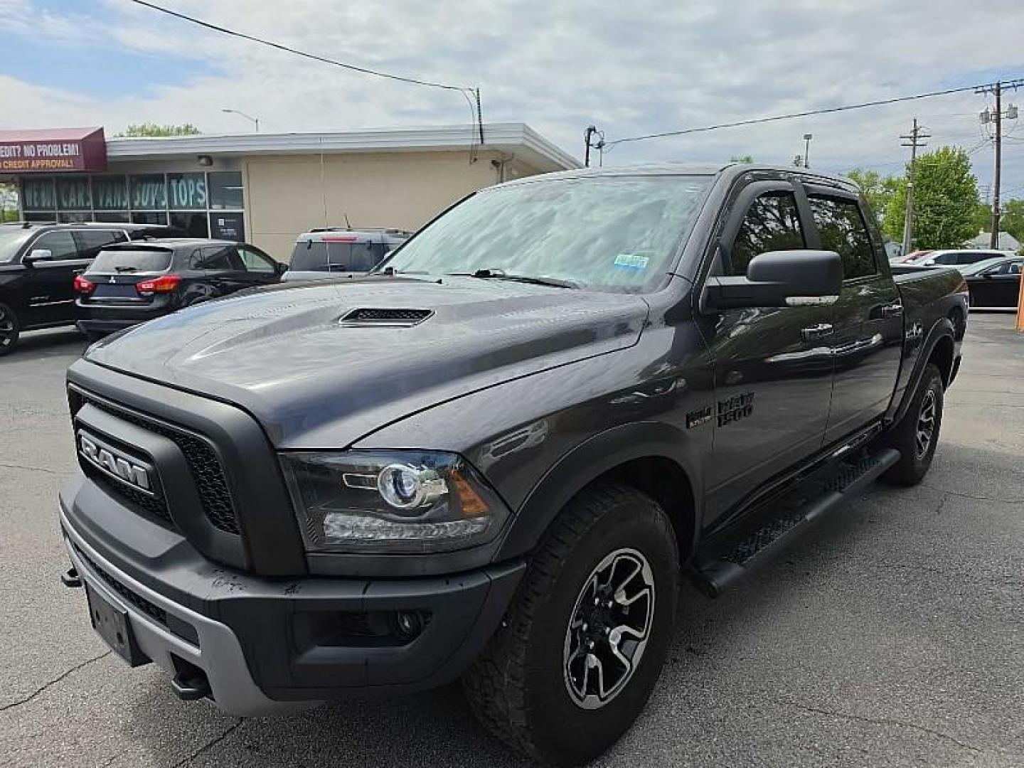 2017 GRAY /BLACK RAM 1500 Rebel Crew Cab SWB 4WD (1C6RR7YT4HS) with an 5.7L V8 OHV 16V engine, 8A transmission, located at 3304 Woodville Road, Northwood, OH, 43619, (419) 210-8019, 41.612694, -83.480743 - Your #1 Destination for Auto Loans and mdash;No Matter Your Credit!At our dealership, we believe everyone deserves the opportunity to drive their dream car and mdash;whether you have good credit, bad credit, or no credit at all. With a wide selection of hundreds of cars, trucks, and SUVs, you'll fin - Photo#0