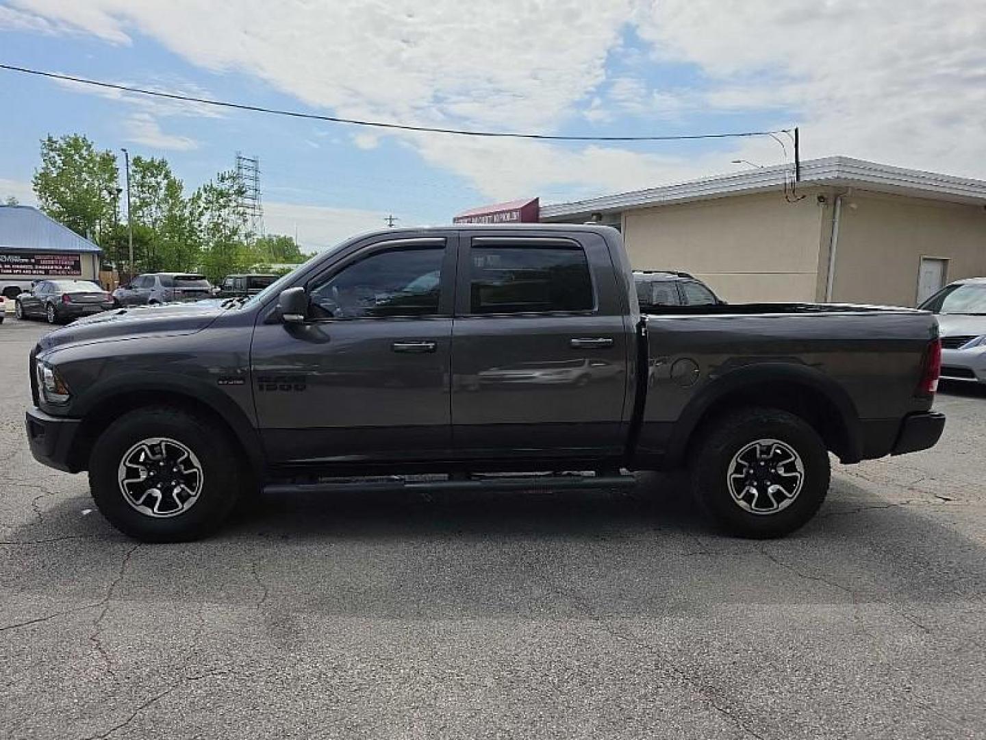 2017 GRAY /BLACK RAM 1500 Rebel Crew Cab SWB 4WD (1C6RR7YT4HS) with an 5.7L V8 OHV 16V engine, 8A transmission, located at 3304 Woodville Road, Northwood, OH, 43619, (419) 210-8019, 41.612694, -83.480743 - Your #1 Destination for Auto Loans and mdash;No Matter Your Credit!At our dealership, we believe everyone deserves the opportunity to drive their dream car and mdash;whether you have good credit, bad credit, or no credit at all. With a wide selection of hundreds of cars, trucks, and SUVs, you'll fin - Photo#1