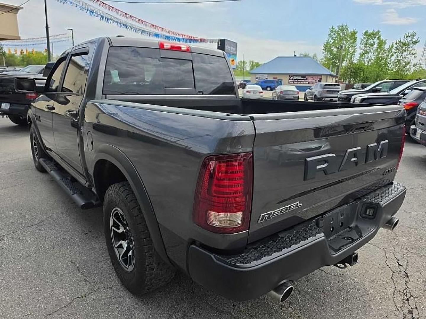 2017 GRAY /BLACK RAM 1500 Rebel Crew Cab SWB 4WD (1C6RR7YT4HS) with an 5.7L V8 OHV 16V engine, 8A transmission, located at 3304 Woodville Road, Northwood, OH, 43619, (419) 210-8019, 41.612694, -83.480743 - Your #1 Destination for Auto Loans and mdash;No Matter Your Credit!At our dealership, we believe everyone deserves the opportunity to drive their dream car and mdash;whether you have good credit, bad credit, or no credit at all. With a wide selection of hundreds of cars, trucks, and SUVs, you'll fin - Photo#2