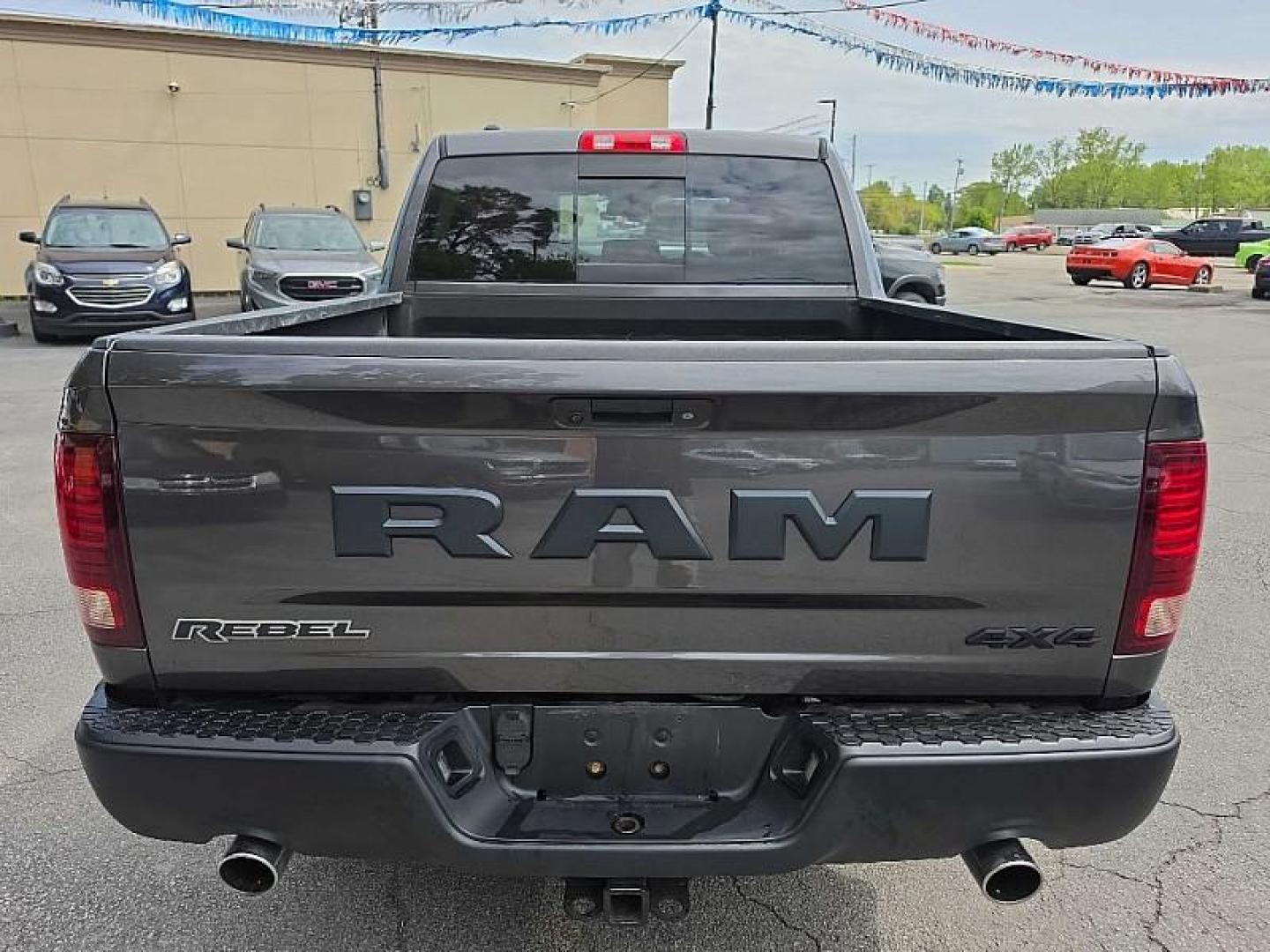 2017 GRAY /BLACK RAM 1500 Rebel Crew Cab SWB 4WD (1C6RR7YT4HS) with an 5.7L V8 OHV 16V engine, 8A transmission, located at 3304 Woodville Road, Northwood, OH, 43619, (419) 210-8019, 41.612694, -83.480743 - Your #1 Destination for Auto Loans and mdash;No Matter Your Credit!At our dealership, we believe everyone deserves the opportunity to drive their dream car and mdash;whether you have good credit, bad credit, or no credit at all. With a wide selection of hundreds of cars, trucks, and SUVs, you'll fin - Photo#3