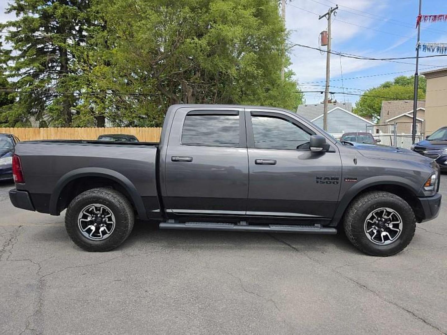 2017 GRAY /BLACK RAM 1500 Rebel Crew Cab SWB 4WD (1C6RR7YT4HS) with an 5.7L V8 OHV 16V engine, 8A transmission, located at 3304 Woodville Road, Northwood, OH, 43619, (419) 210-8019, 41.612694, -83.480743 - Your #1 Destination for Auto Loans and mdash;No Matter Your Credit!At our dealership, we believe everyone deserves the opportunity to drive their dream car and mdash;whether you have good credit, bad credit, or no credit at all. With a wide selection of hundreds of cars, trucks, and SUVs, you'll fin - Photo#5