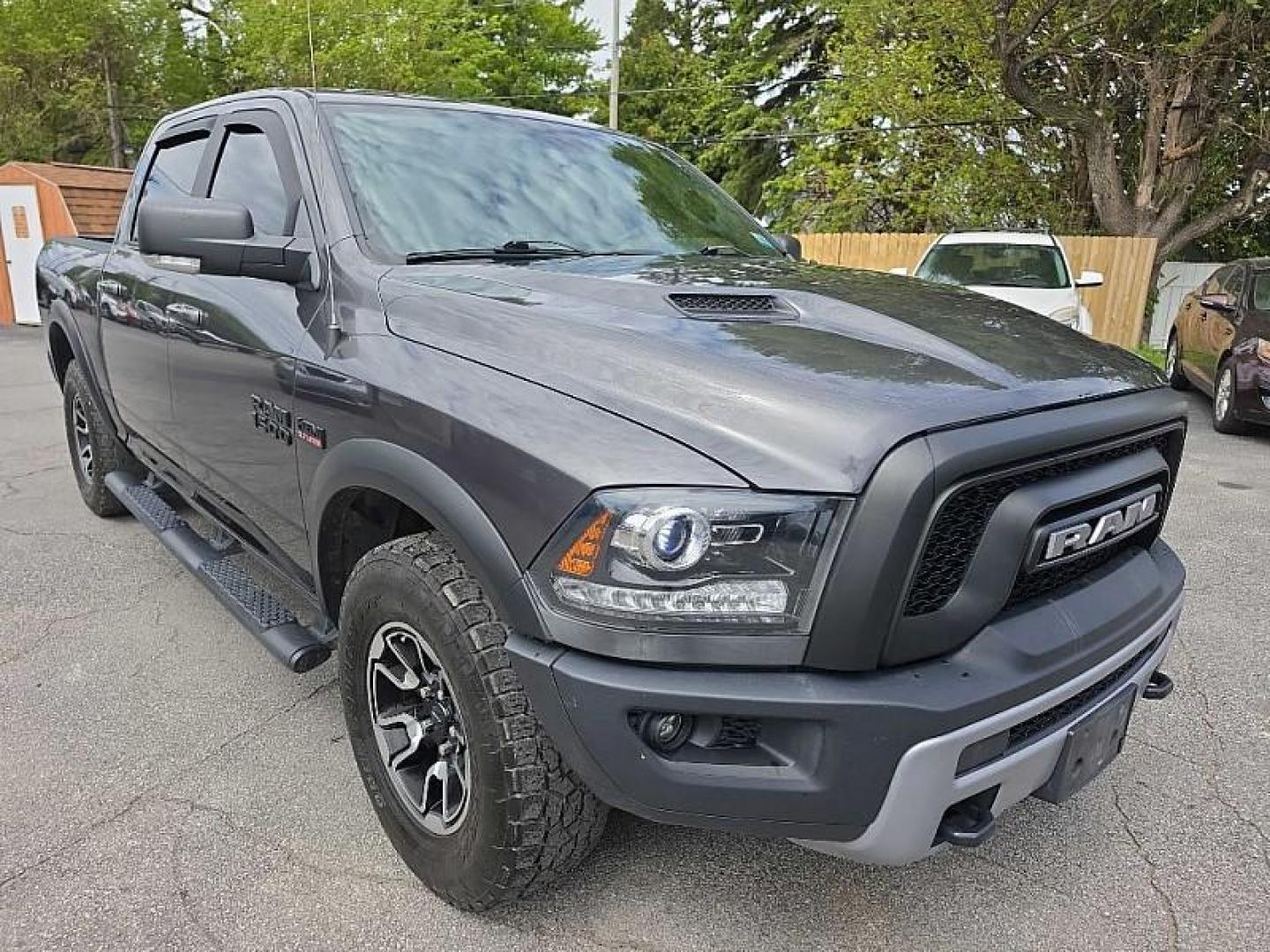 2017 GRAY /BLACK RAM 1500 Rebel Crew Cab SWB 4WD (1C6RR7YT4HS) with an 5.7L V8 OHV 16V engine, 8A transmission, located at 3304 Woodville Road, Northwood, OH, 43619, (419) 210-8019, 41.612694, -83.480743 - Your #1 Destination for Auto Loans and mdash;No Matter Your Credit!At our dealership, we believe everyone deserves the opportunity to drive their dream car and mdash;whether you have good credit, bad credit, or no credit at all. With a wide selection of hundreds of cars, trucks, and SUVs, you'll fin - Photo#6