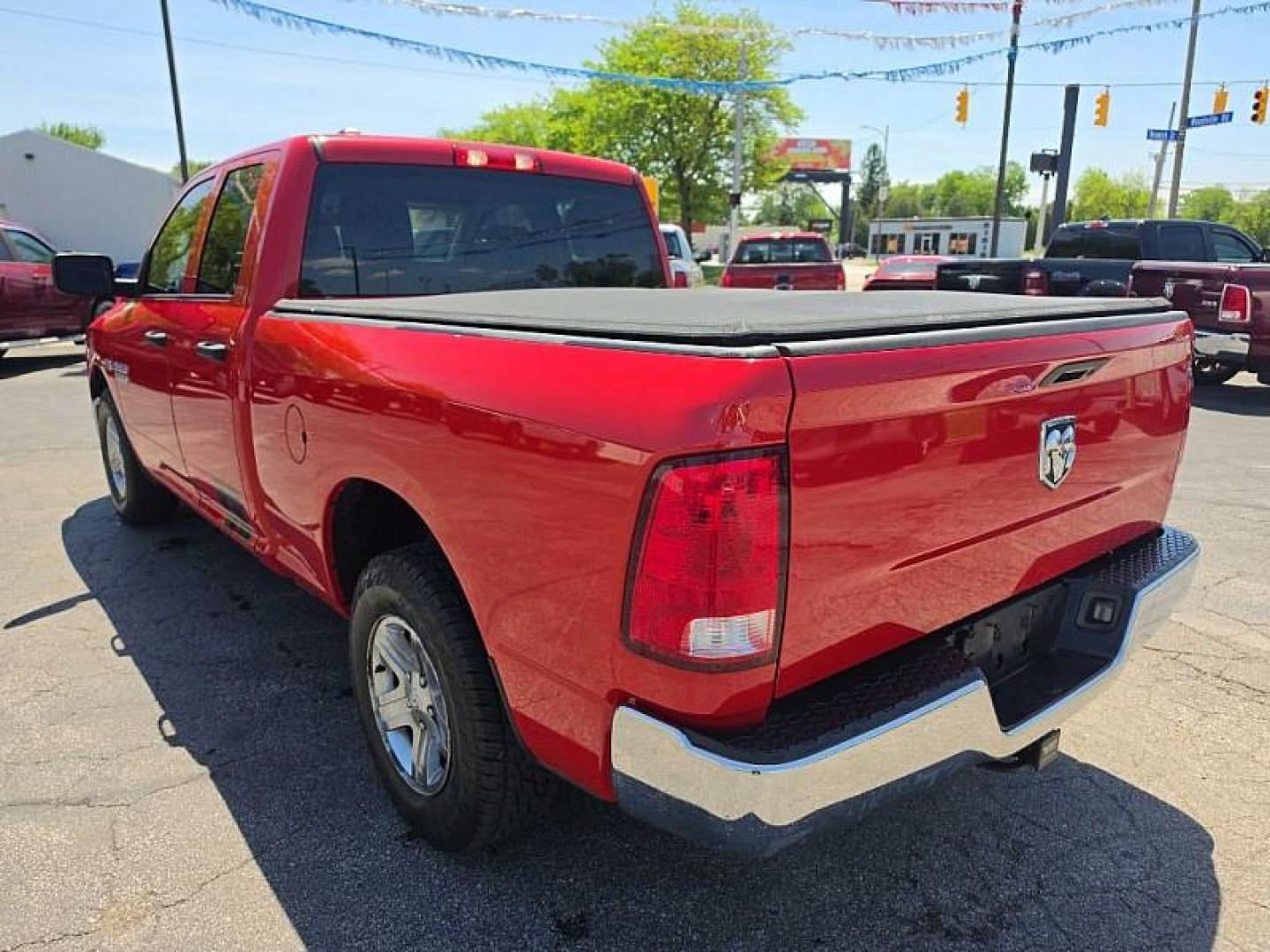 2018 RED /GRAY RAM 1500 Tradesman Quad Cab 2WD (1C6RR6FT8JS) with an 5.7L V8 OHV 16V engine, 8A transmission, located at 3304 Woodville Road, Northwood, OH, 43619, (419) 210-8019, 41.612694, -83.480743 - Your #1 Destination for Auto Loans and mdash;No Matter Your Credit!At our dealership, we believe everyone deserves the opportunity to drive their dream car and mdash;whether you have good credit, bad credit, or no credit at all. With a wide selection of hundreds of cars, trucks, and SUVs, you'll fin - Photo#2