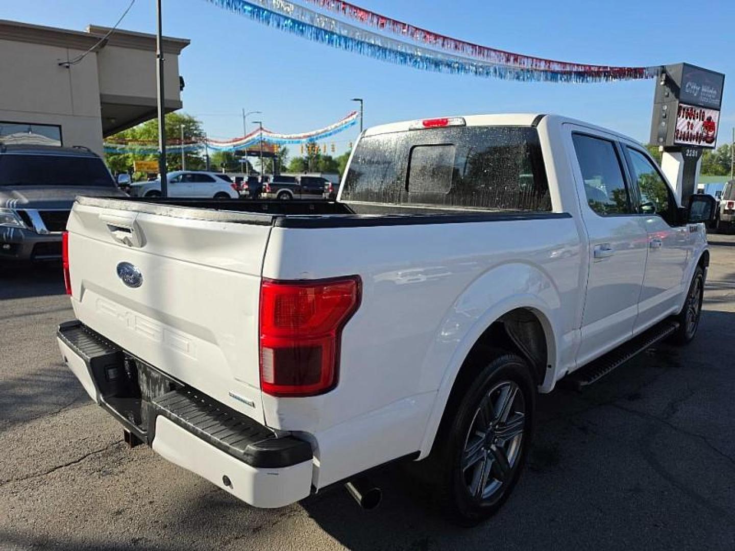 2020 WHITE /BLACK Ford F-150 XLT SuperCrew 6.5-ft. Bed 4WD (1FTEW1EPXLF) with an 2.7L V6 DOHC 24V engine, 6A transmission, located at 3304 Woodville Road, Northwood, OH, 43619, (419) 210-8019, 41.612694, -83.480743 - Your #1 Destination for Auto Loans and mdash;No Matter Your Credit!At our dealership, we believe everyone deserves the opportunity to drive their dream car and mdash;whether you have good credit, bad credit, or no credit at all. With a wide selection of hundreds of cars, trucks, and SUVs, you'll fin - Photo#4