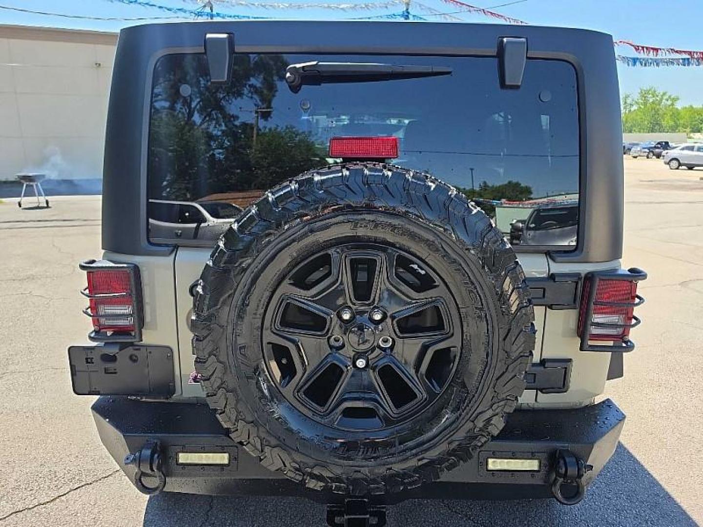 2018 TAN /BLACK/TAN Jeep Wrangler Unlimited Sport 4WD (1C4BJWDG5JL) with an 3.6L V6 DOHC 24V FFV engine, Automatic 5-Spd transmission, located at 3304 Woodville Road, Northwood, OH, 43619, (419) 210-8019, 41.612694, -83.480743 - Your #1 Destination for Auto Loans and mdash;No Matter Your Credit!At our dealership, we believe everyone deserves the opportunity to drive their dream car and mdash;whether you have good credit, bad credit, or no credit at all. With a wide selection of hundreds of cars, trucks, and SUVs, you'll fin - Photo#3