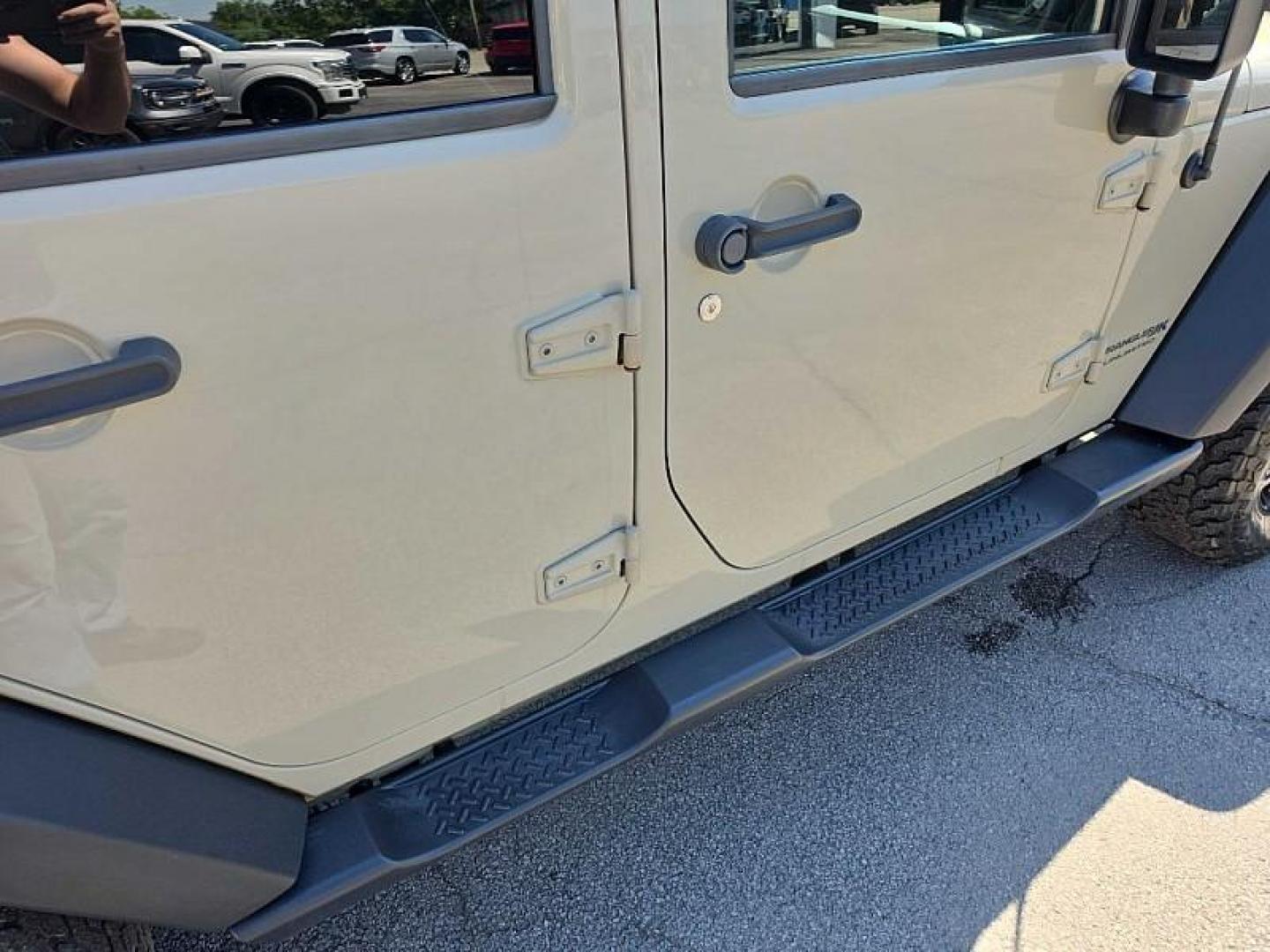 2018 TAN /BLACK/TAN Jeep Wrangler Unlimited Sport 4WD (1C4BJWDG5JL) with an 3.6L V6 DOHC 24V FFV engine, Automatic 5-Spd transmission, located at 3304 Woodville Road, Northwood, OH, 43619, (419) 210-8019, 41.612694, -83.480743 - Your #1 Destination for Auto Loans and mdash;No Matter Your Credit!At our dealership, we believe everyone deserves the opportunity to drive their dream car and mdash;whether you have good credit, bad credit, or no credit at all. With a wide selection of hundreds of cars, trucks, and SUVs, you'll fin - Photo#30