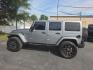 2018 SILVER /BLACK Jeep Wrangler Unlimited Sahara 4WD (1C4BJWEG9JL) with an 3.6L V6 DOHC 24V FFV engine, Automatic 5-Spd transmission, located at 3304 Woodville Road, Northwood, OH, 43619, (419) 210-8019, 41.612694, -83.480743 - Your #1 Destination for Auto Loans and mdash;No Matter Your Credit!At our dealership, we believe everyone deserves the opportunity to drive their dream car and mdash;whether you have good credit, bad credit, or no credit at all. With a wide selection of hundreds of cars, trucks, and SUVs, you'll fin - Photo#1