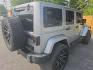 2018 SILVER /BLACK Jeep Wrangler Unlimited Sahara 4WD (1C4BJWEG9JL) with an 3.6L V6 DOHC 24V FFV engine, Automatic 5-Spd transmission, located at 3304 Woodville Road, Northwood, OH, 43619, (419) 210-8019, 41.612694, -83.480743 - Your #1 Destination for Auto Loans and mdash;No Matter Your Credit!At our dealership, we believe everyone deserves the opportunity to drive their dream car and mdash;whether you have good credit, bad credit, or no credit at all. With a wide selection of hundreds of cars, trucks, and SUVs, you'll fin - Photo#2