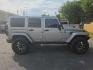 2018 SILVER /BLACK Jeep Wrangler Unlimited Sahara 4WD (1C4BJWEG9JL) with an 3.6L V6 DOHC 24V FFV engine, Automatic 5-Spd transmission, located at 3304 Woodville Road, Northwood, OH, 43619, (419) 210-8019, 41.612694, -83.480743 - Your #1 Destination for Auto Loans and mdash;No Matter Your Credit!At our dealership, we believe everyone deserves the opportunity to drive their dream car and mdash;whether you have good credit, bad credit, or no credit at all. With a wide selection of hundreds of cars, trucks, and SUVs, you'll fin - Photo#5