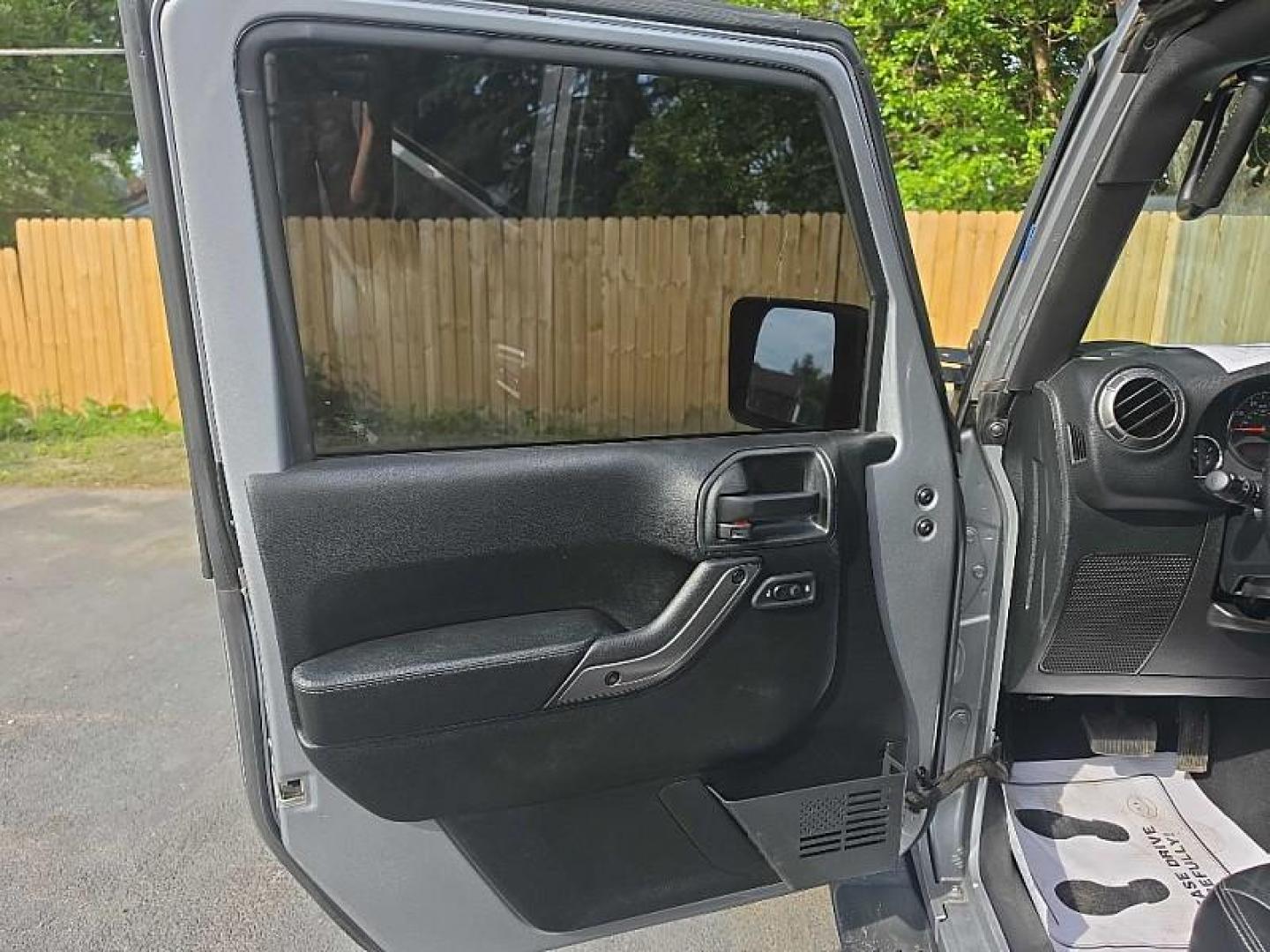 2018 SILVER /BLACK Jeep Wrangler Unlimited Sahara 4WD (1C4BJWEG9JL) with an 3.6L V6 DOHC 24V FFV engine, Automatic 5-Spd transmission, located at 3304 Woodville Road, Northwood, OH, 43619, (419) 210-8019, 41.612694, -83.480743 - Your #1 Destination for Auto Loans and mdash;No Matter Your Credit!At our dealership, we believe everyone deserves the opportunity to drive their dream car and mdash;whether you have good credit, bad credit, or no credit at all. With a wide selection of hundreds of cars, trucks, and SUVs, you'll fin - Photo#27