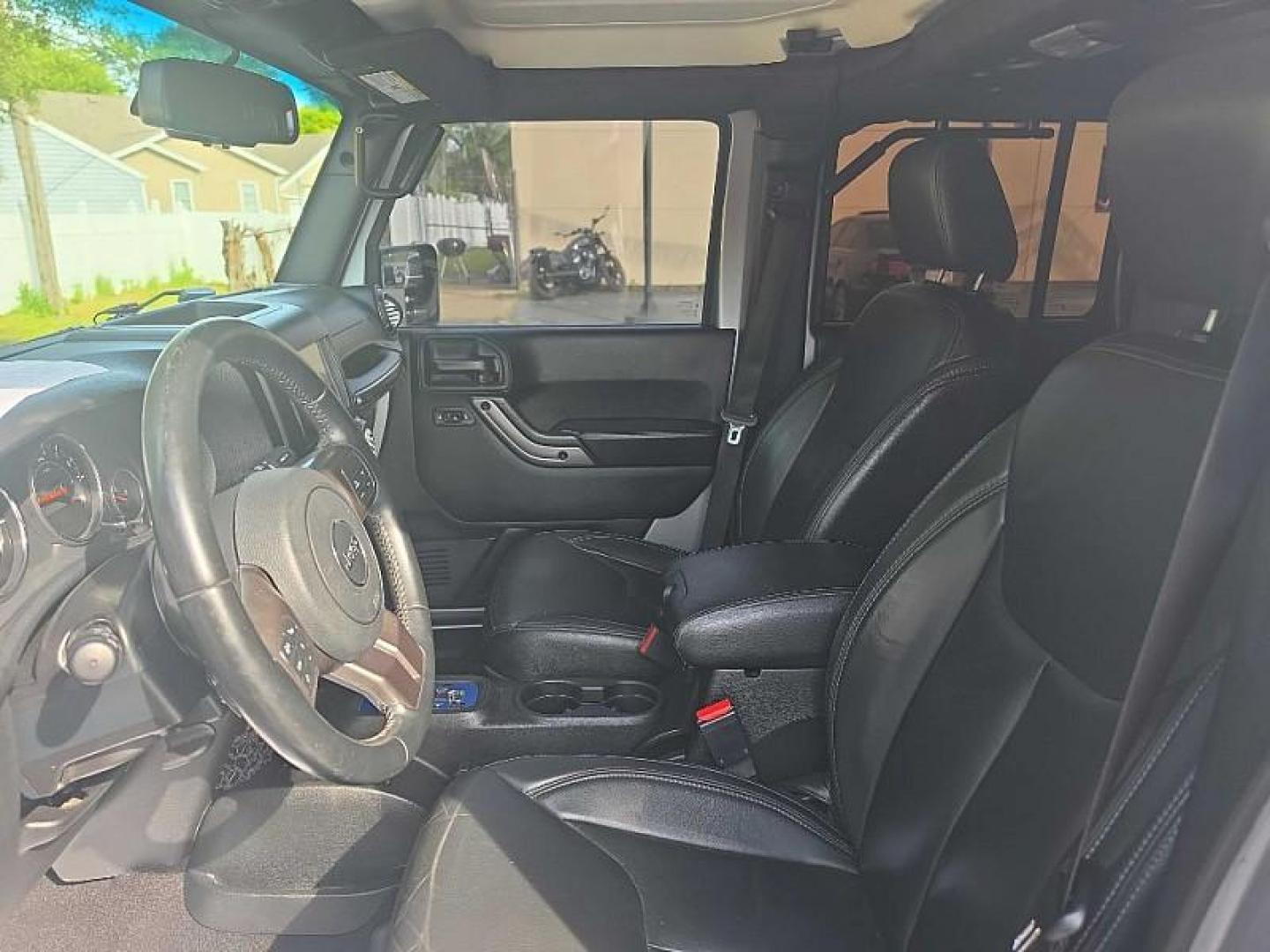 2018 SILVER /BLACK Jeep Wrangler Unlimited Sahara 4WD (1C4BJWEG9JL) with an 3.6L V6 DOHC 24V FFV engine, Automatic 5-Spd transmission, located at 3304 Woodville Road, Northwood, OH, 43619, (419) 210-8019, 41.612694, -83.480743 - Your #1 Destination for Auto Loans and mdash;No Matter Your Credit!At our dealership, we believe everyone deserves the opportunity to drive their dream car and mdash;whether you have good credit, bad credit, or no credit at all. With a wide selection of hundreds of cars, trucks, and SUVs, you'll fin - Photo#28