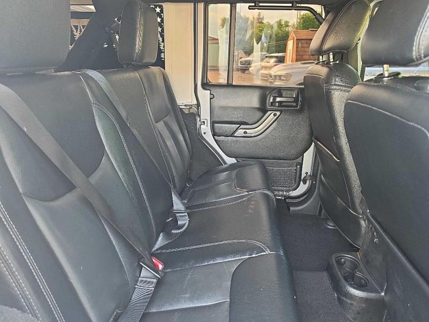 2018 SILVER /BLACK Jeep Wrangler Unlimited Sahara 4WD (1C4BJWEG9JL) with an 3.6L V6 DOHC 24V FFV engine, Automatic 5-Spd transmission, located at 3304 Woodville Road, Northwood, OH, 43619, (419) 210-8019, 41.612694, -83.480743 - Your #1 Destination for Auto Loans and mdash;No Matter Your Credit!At our dealership, we believe everyone deserves the opportunity to drive their dream car and mdash;whether you have good credit, bad credit, or no credit at all. With a wide selection of hundreds of cars, trucks, and SUVs, you'll fin - Photo#33