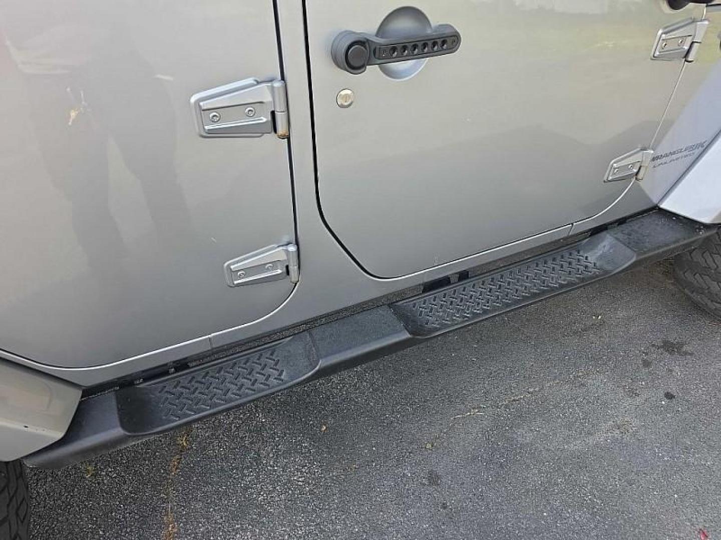 2018 SILVER /BLACK Jeep Wrangler Unlimited Sahara 4WD (1C4BJWEG9JL) with an 3.6L V6 DOHC 24V FFV engine, Automatic 5-Spd transmission, located at 3304 Woodville Road, Northwood, OH, 43619, (419) 210-8019, 41.612694, -83.480743 - Your #1 Destination for Auto Loans and mdash;No Matter Your Credit!At our dealership, we believe everyone deserves the opportunity to drive their dream car and mdash;whether you have good credit, bad credit, or no credit at all. With a wide selection of hundreds of cars, trucks, and SUVs, you'll fin - Photo#36