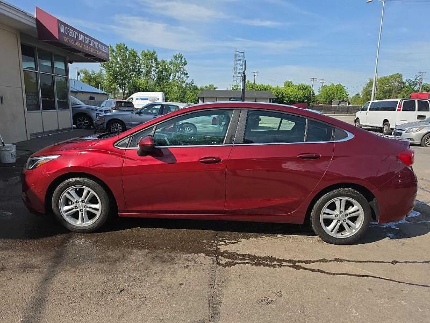 2016 RED /BLACK Chevrolet Cruze LT Auto (1G1BE5SM0G7) with an 1.4L L4 DOHC 16V TURBO engine, 6A transmission, located at 3304 Woodville Road, Northwood, OH, 43619, (419) 210-8019, 41.612694, -83.480743 - Your #1 Destination for Auto Loans and mdash;No Matter Your Credit!At our dealership, we believe everyone deserves the opportunity to drive their dream car and mdash;whether you have good credit, bad credit, or no credit at all. With a wide selection of hundreds of cars, trucks, and SUVs, you'll fin - Photo#1