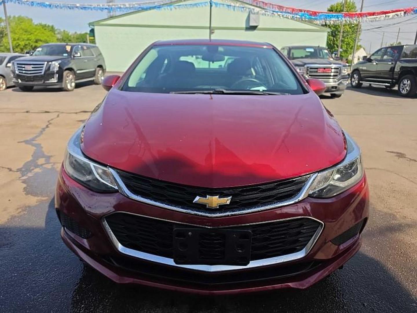 2016 RED /BLACK Chevrolet Cruze LT Auto (1G1BE5SM0G7) with an 1.4L L4 DOHC 16V TURBO engine, 6A transmission, located at 3304 Woodville Road, Northwood, OH, 43619, (419) 210-8019, 41.612694, -83.480743 - Your #1 Destination for Auto Loans and mdash;No Matter Your Credit!At our dealership, we believe everyone deserves the opportunity to drive their dream car and mdash;whether you have good credit, bad credit, or no credit at all. With a wide selection of hundreds of cars, trucks, and SUVs, you'll fin - Photo#7