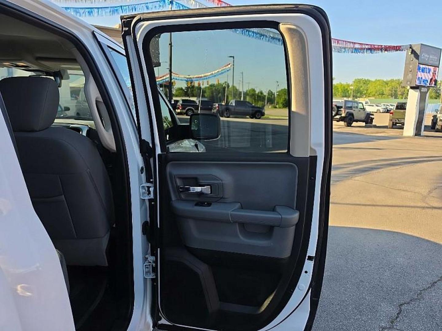 2019 WHITE /GRAY RAM 1500 Classic Tradesman Quad Cab 4WD (1C6RR7GG6KS) with an 3.6L V6 DOHC 24V FFV engine, 8A transmission, located at 3304 Woodville Road, Northwood, OH, 43619, (419) 210-8019, 41.612694, -83.480743 - Your #1 Destination for Auto Loans and mdash;No Matter Your Credit!At our dealership, we believe everyone deserves the opportunity to drive their dream car and mdash;whether you have good credit, bad credit, or no credit at all. With a wide selection of hundreds of cars, trucks, and SUVs, you'll fin - Photo#12