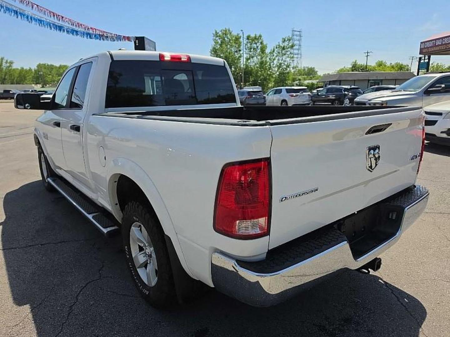 2017 WHITE /GRAY RAM 1500 SLT Quad Cab 4WD (1C6RR7GG5HS) with an 3.6L V6 DOHC 24V FFV engine, 8A transmission, located at 3304 Woodville Road, Northwood, OH, 43619, (419) 210-8019, 41.612694, -83.480743 - Your #1 Destination for Auto Loans and mdash;No Matter Your Credit!At our dealership, we believe everyone deserves the opportunity to drive their dream car and mdash;whether you have good credit, bad credit, or no credit at all. With a wide selection of hundreds of cars, trucks, and SUVs, you'll fin - Photo#2