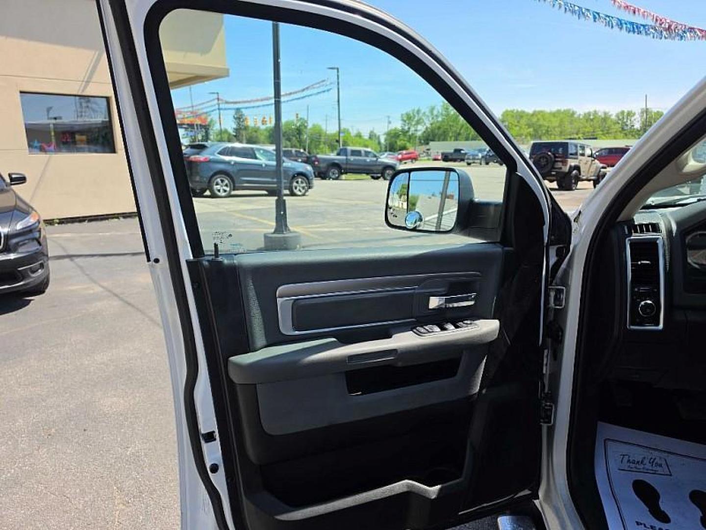 2017 WHITE /GRAY RAM 1500 SLT Quad Cab 4WD (1C6RR7GG5HS) with an 3.6L V6 DOHC 24V FFV engine, 8A transmission, located at 3304 Woodville Road, Northwood, OH, 43619, (419) 210-8019, 41.612694, -83.480743 - Your #1 Destination for Auto Loans and mdash;No Matter Your Credit!At our dealership, we believe everyone deserves the opportunity to drive their dream car and mdash;whether you have good credit, bad credit, or no credit at all. With a wide selection of hundreds of cars, trucks, and SUVs, you'll fin - Photo#8