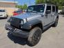 2016 SILVER /BLACK Jeep Wrangler Unlimited Sport 4WD (1C4BJWDG7GL) with an 3.6L V6 DOHC 24V FFV engine, Automatic 5-Spd transmission, located at 3304 Woodville Road, Northwood, OH, 43619, (419) 210-8019, 41.612694, -83.480743 - Your #1 Destination for Auto Loans and mdash;No Matter Your Credit!At our dealership, we believe everyone deserves the opportunity to drive their dream car and mdash;whether you have good credit, bad credit, or no credit at all. With a wide selection of hundreds of cars, trucks, and SUVs, you'll fin - Photo#0