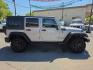 2016 SILVER /BLACK Jeep Wrangler Unlimited Sport 4WD (1C4BJWDG7GL) with an 3.6L V6 DOHC 24V FFV engine, Automatic 5-Spd transmission, located at 3304 Woodville Road, Northwood, OH, 43619, (419) 210-8019, 41.612694, -83.480743 - Your #1 Destination for Auto Loans and mdash;No Matter Your Credit!At our dealership, we believe everyone deserves the opportunity to drive their dream car and mdash;whether you have good credit, bad credit, or no credit at all. With a wide selection of hundreds of cars, trucks, and SUVs, you'll fin - Photo#5