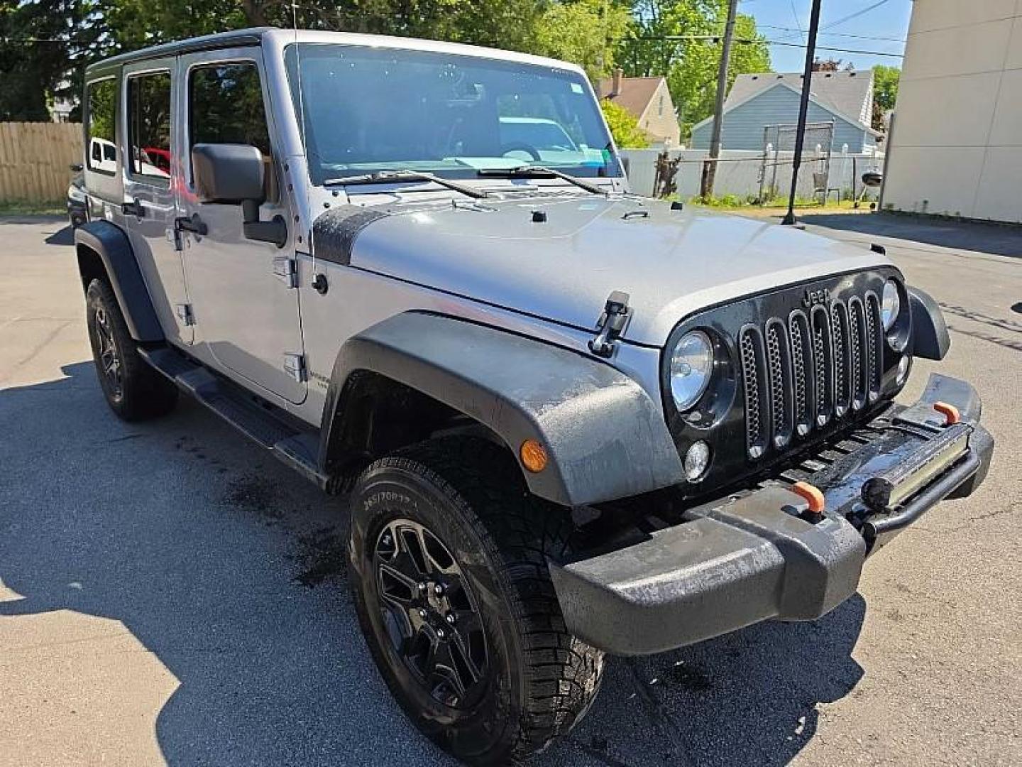 2016 SILVER /BLACK Jeep Wrangler Unlimited Sport 4WD (1C4BJWDG7GL) with an 3.6L V6 DOHC 24V FFV engine, Automatic 5-Spd transmission, located at 3304 Woodville Road, Northwood, OH, 43619, (419) 210-8019, 41.612694, -83.480743 - Your #1 Destination for Auto Loans and mdash;No Matter Your Credit!At our dealership, we believe everyone deserves the opportunity to drive their dream car and mdash;whether you have good credit, bad credit, or no credit at all. With a wide selection of hundreds of cars, trucks, and SUVs, you'll fin - Photo#6