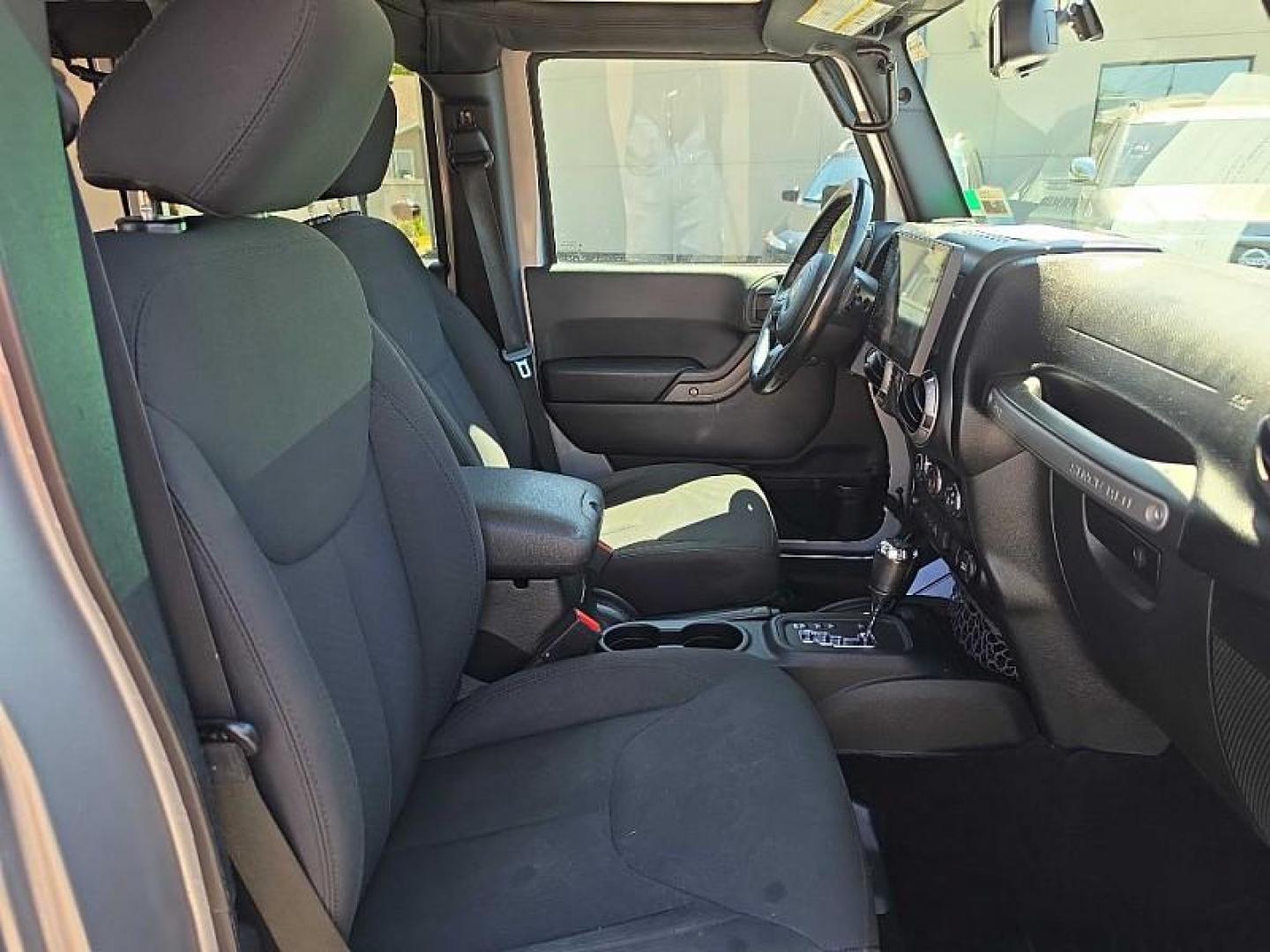 2016 SILVER /BLACK Jeep Wrangler Unlimited Sport 4WD (1C4BJWDG7GL) with an 3.6L V6 DOHC 24V FFV engine, Automatic 5-Spd transmission, located at 3304 Woodville Road, Northwood, OH, 43619, (419) 210-8019, 41.612694, -83.480743 - Your #1 Destination for Auto Loans and mdash;No Matter Your Credit!At our dealership, we believe everyone deserves the opportunity to drive their dream car and mdash;whether you have good credit, bad credit, or no credit at all. With a wide selection of hundreds of cars, trucks, and SUVs, you'll fin - Photo#15