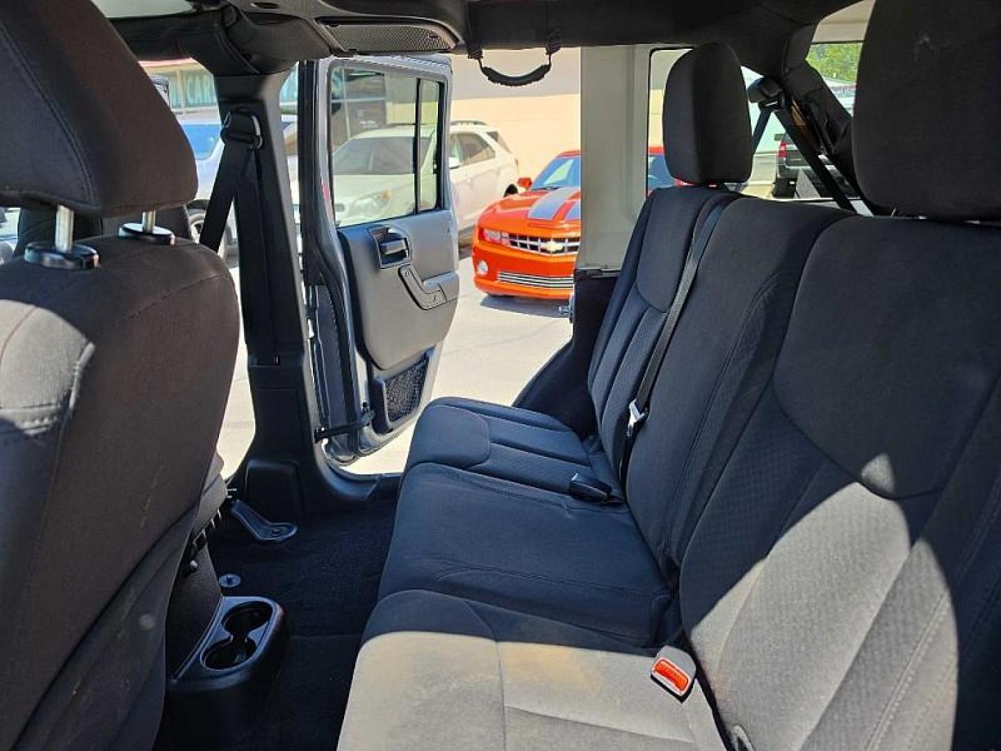 2016 SILVER /BLACK Jeep Wrangler Unlimited Sport 4WD (1C4BJWDG7GL) with an 3.6L V6 DOHC 24V FFV engine, Automatic 5-Spd transmission, located at 3304 Woodville Road, Northwood, OH, 43619, (419) 210-8019, 41.612694, -83.480743 - Your #1 Destination for Auto Loans and mdash;No Matter Your Credit!At our dealership, we believe everyone deserves the opportunity to drive their dream car and mdash;whether you have good credit, bad credit, or no credit at all. With a wide selection of hundreds of cars, trucks, and SUVs, you'll fin - Photo#26