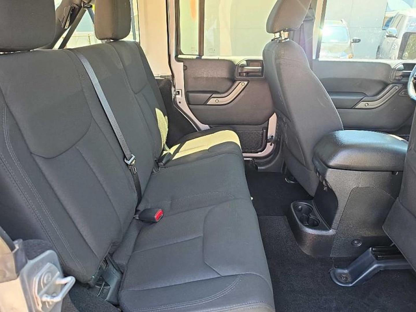 2016 SILVER /BLACK Jeep Wrangler Unlimited Sport 4WD (1C4BJWDG7GL) with an 3.6L V6 DOHC 24V FFV engine, Automatic 5-Spd transmission, located at 3304 Woodville Road, Northwood, OH, 43619, (419) 210-8019, 41.612694, -83.480743 - Your #1 Destination for Auto Loans and mdash;No Matter Your Credit!At our dealership, we believe everyone deserves the opportunity to drive their dream car and mdash;whether you have good credit, bad credit, or no credit at all. With a wide selection of hundreds of cars, trucks, and SUVs, you'll fin - Photo#28