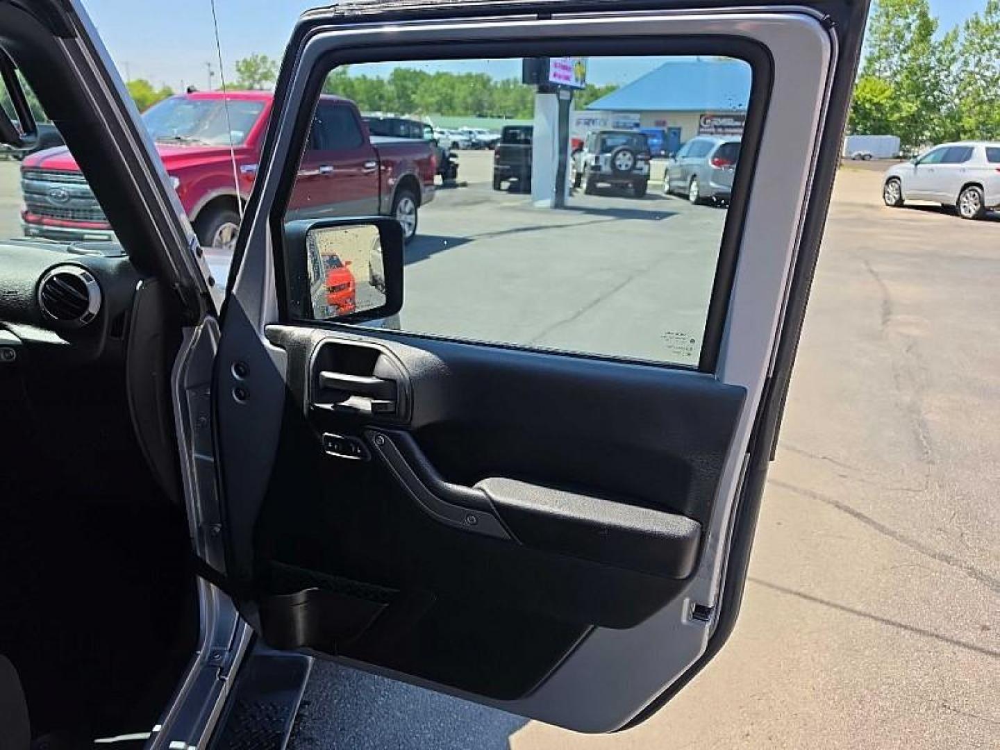 2016 SILVER /BLACK Jeep Wrangler Unlimited Sport 4WD (1C4BJWDG7GL) with an 3.6L V6 DOHC 24V FFV engine, Automatic 5-Spd transmission, located at 3304 Woodville Road, Northwood, OH, 43619, (419) 210-8019, 41.612694, -83.480743 - Your #1 Destination for Auto Loans and mdash;No Matter Your Credit!At our dealership, we believe everyone deserves the opportunity to drive their dream car and mdash;whether you have good credit, bad credit, or no credit at all. With a wide selection of hundreds of cars, trucks, and SUVs, you'll fin - Photo#29