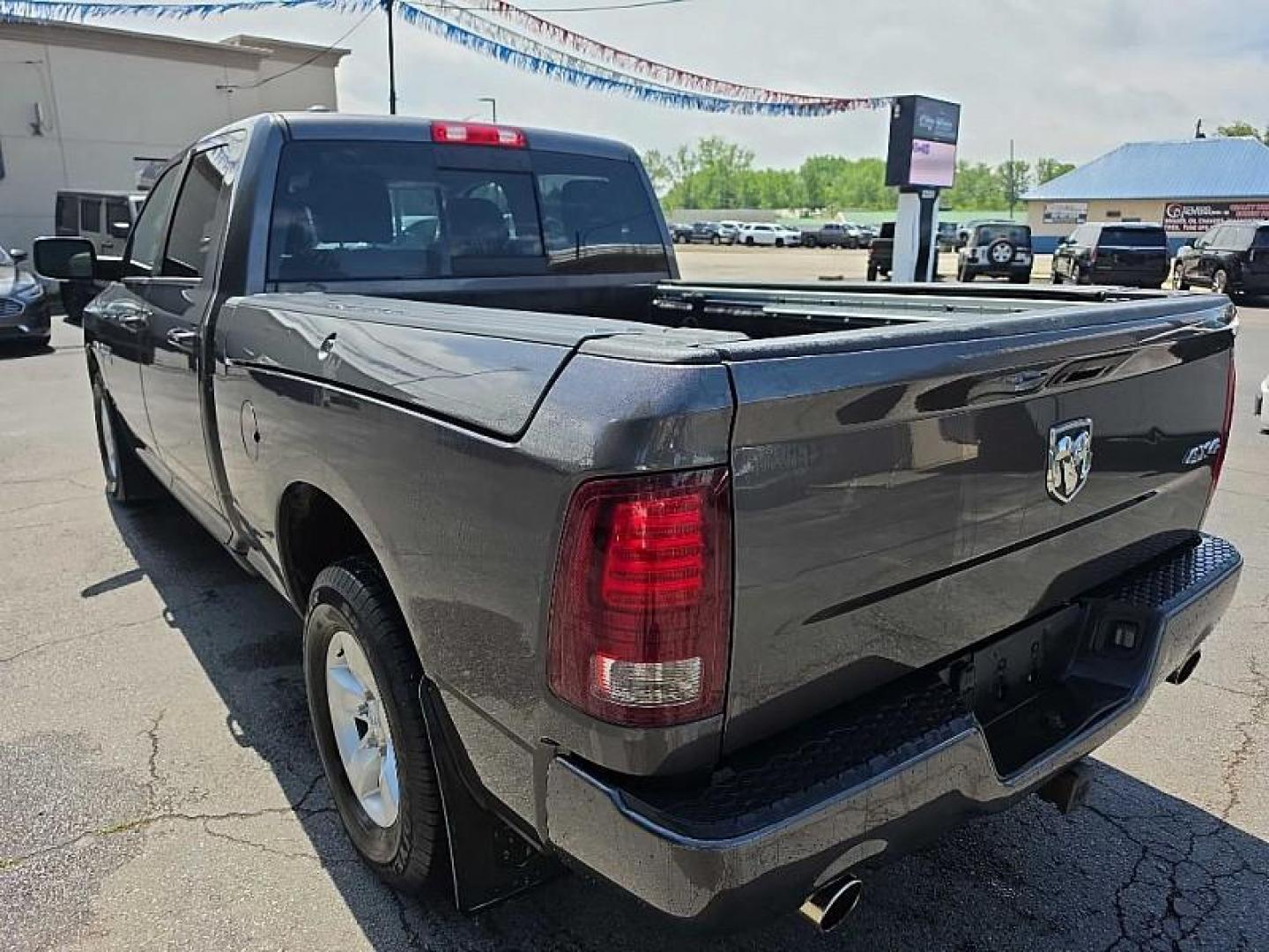 2016 GRAY /BLACK RAM 1500 Sport Crew Cab LWB 4WD (1C6RR7UT0GS) with an 5.7L V8 OHV 16V engine, 6A transmission, located at 3304 Woodville Road, Northwood, OH, 43619, (419) 210-8019, 41.612694, -83.480743 - Your #1 Destination for Auto Loans and mdash;No Matter Your Credit!At our dealership, we believe everyone deserves the opportunity to drive their dream car and mdash;whether you have good credit, bad credit, or no credit at all. With a wide selection of hundreds of cars, trucks, and SUVs, you'll fin - Photo#1
