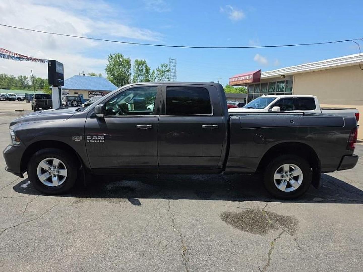 2016 GRAY /BLACK RAM 1500 Sport Crew Cab LWB 4WD (1C6RR7UT0GS) with an 5.7L V8 OHV 16V engine, 6A transmission, located at 3304 Woodville Road, Northwood, OH, 43619, (419) 210-8019, 41.612694, -83.480743 - Your #1 Destination for Auto Loans and mdash;No Matter Your Credit!At our dealership, we believe everyone deserves the opportunity to drive their dream car and mdash;whether you have good credit, bad credit, or no credit at all. With a wide selection of hundreds of cars, trucks, and SUVs, you'll fin - Photo#4