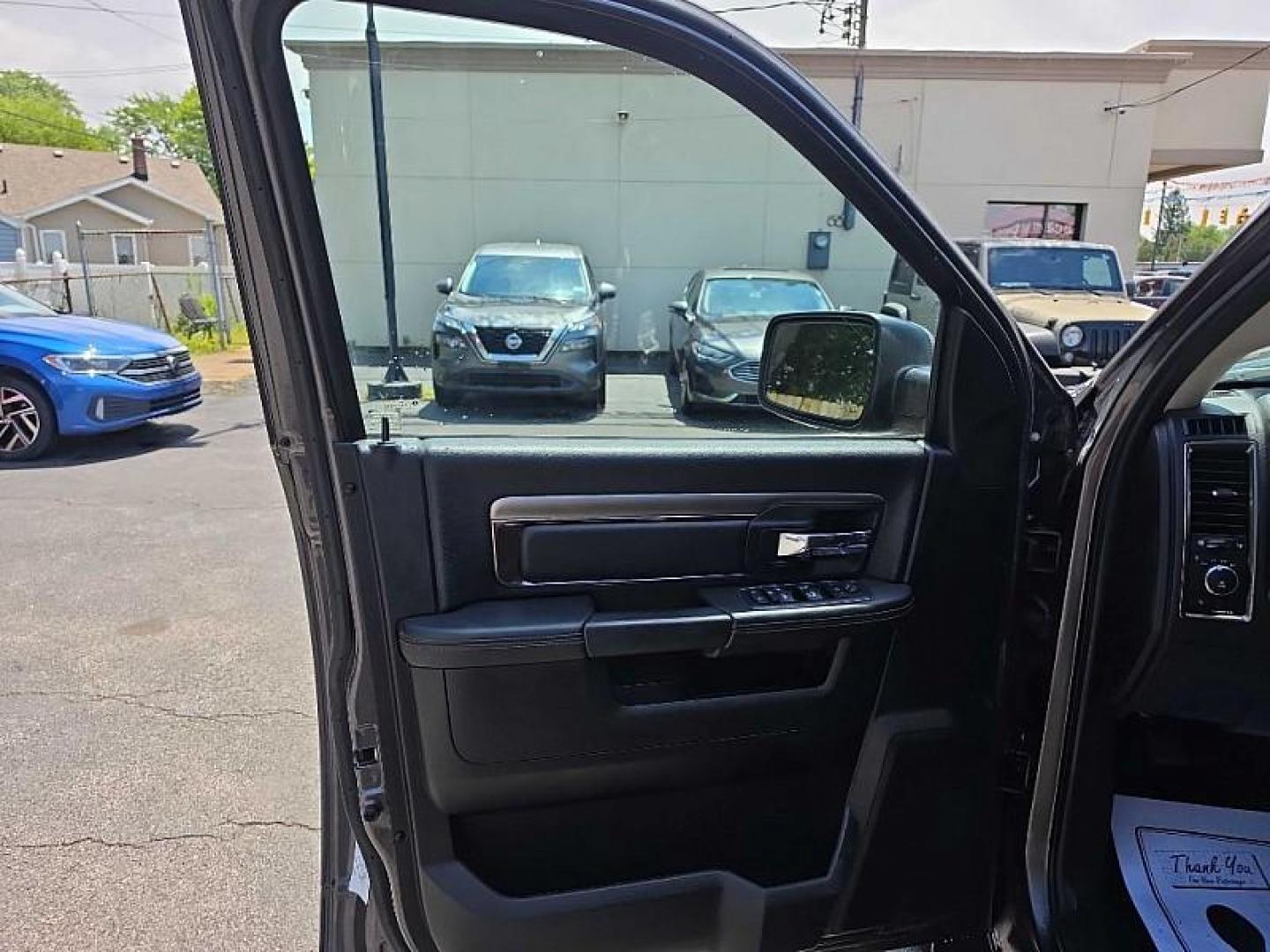 2016 GRAY /BLACK RAM 1500 Sport Crew Cab LWB 4WD (1C6RR7UT0GS) with an 5.7L V8 OHV 16V engine, 6A transmission, located at 3304 Woodville Road, Northwood, OH, 43619, (419) 210-8019, 41.612694, -83.480743 - Your #1 Destination for Auto Loans and mdash;No Matter Your Credit!At our dealership, we believe everyone deserves the opportunity to drive their dream car and mdash;whether you have good credit, bad credit, or no credit at all. With a wide selection of hundreds of cars, trucks, and SUVs, you'll fin - Photo#8