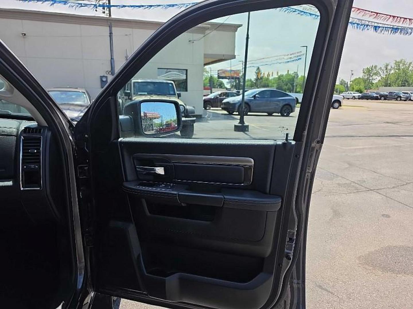 2016 GRAY /BLACK RAM 1500 Sport Crew Cab LWB 4WD (1C6RR7UT0GS) with an 5.7L V8 OHV 16V engine, 6A transmission, located at 3304 Woodville Road, Northwood, OH, 43619, (419) 210-8019, 41.612694, -83.480743 - Your #1 Destination for Auto Loans and mdash;No Matter Your Credit!At our dealership, we believe everyone deserves the opportunity to drive their dream car and mdash;whether you have good credit, bad credit, or no credit at all. With a wide selection of hundreds of cars, trucks, and SUVs, you'll fin - Photo#15