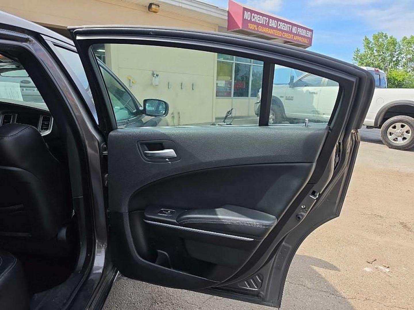 2021 GRAY /BLACK Dodge Charger SXT (2C3CDXBGXMH) with an 3.6L V6 DOHC 24V engine, 8A transmission, located at 3304 Woodville Road, Northwood, OH, 43619, (419) 210-8019, 41.612694, -83.480743 - Your #1 Destination for Auto Loans and mdash;No Matter Your Credit!At our dealership, we believe everyone deserves the opportunity to drive their dream car and mdash;whether you have good credit, bad credit, or no credit at all. With a wide selection of hundreds of cars, trucks, and SUVs, you'll fin - Photo#13