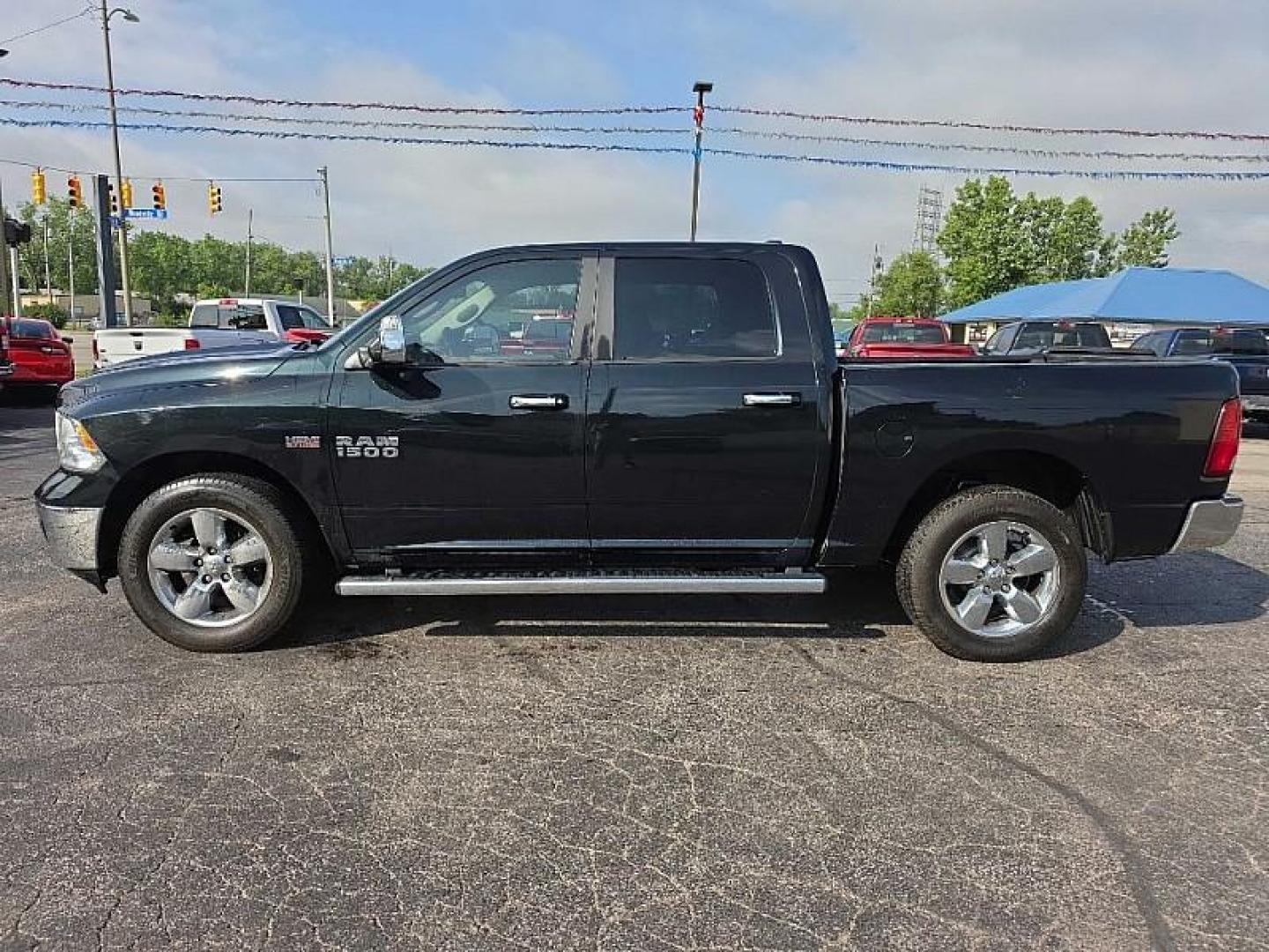 2017 GREEN /BLACK RAM 1500 SLT Crew Cab SWB 4WD (1C6RR7LT4HS) with an 5.7L V8 OHV 16V engine, 8A transmission, located at 3304 Woodville Road, Northwood, OH, 43619, (419) 210-8019, 41.612694, -83.480743 - Your #1 Destination for Auto Loans and mdash;No Matter Your Credit!At our dealership, we believe everyone deserves the opportunity to drive their dream car and mdash;whether you have good credit, bad credit, or no credit at all. With a wide selection of hundreds of cars, trucks, and SUVs, you'll fin - Photo#1