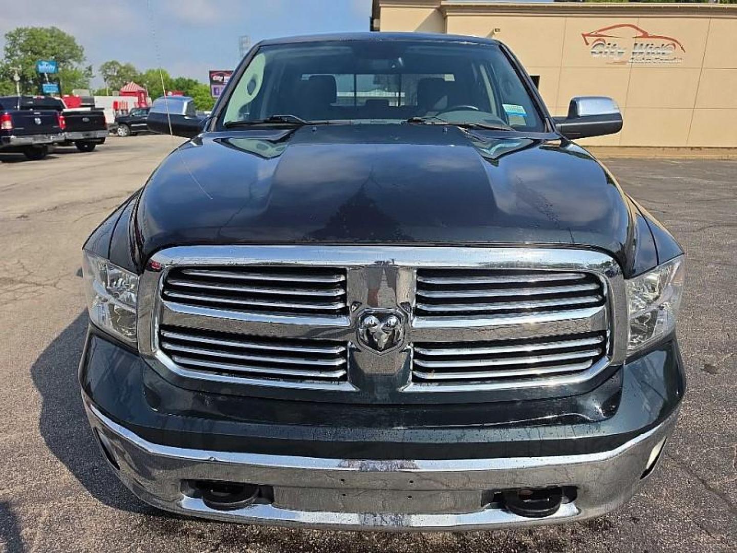 2017 GREEN /BLACK RAM 1500 SLT Crew Cab SWB 4WD (1C6RR7LT4HS) with an 5.7L V8 OHV 16V engine, 8A transmission, located at 3304 Woodville Road, Northwood, OH, 43619, (419) 210-8019, 41.612694, -83.480743 - Your #1 Destination for Auto Loans and mdash;No Matter Your Credit!At our dealership, we believe everyone deserves the opportunity to drive their dream car and mdash;whether you have good credit, bad credit, or no credit at all. With a wide selection of hundreds of cars, trucks, and SUVs, you'll fin - Photo#7