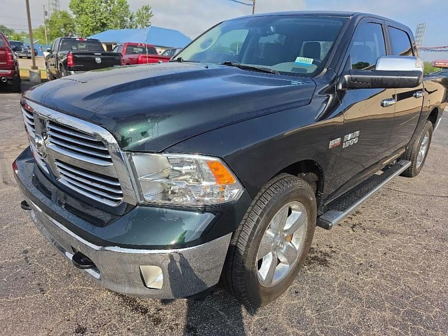 2017 GREEN /BLACK RAM 1500 SLT Crew Cab SWB 4WD (1C6RR7LT4HS) with an 5.7L V8 OHV 16V engine, 8A transmission, located at 3304 Woodville Road, Northwood, OH, 43619, (419) 210-8019, 41.612694, -83.480743 - Your #1 Destination for Auto Loans and mdash;No Matter Your Credit!At our dealership, we believe everyone deserves the opportunity to drive their dream car and mdash;whether you have good credit, bad credit, or no credit at all. With a wide selection of hundreds of cars, trucks, and SUVs, you'll fin - Photo#0
