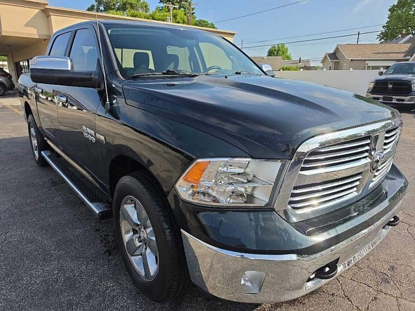2017 GREEN /BLACK RAM 1500 SLT Crew Cab SWB 4WD (1C6RR7LT4HS) with an 5.7L V8 OHV 16V engine, 8A transmission, located at 3304 Woodville Road, Northwood, OH, 43619, (419) 210-8019, 41.612694, -83.480743 - Your #1 Destination for Auto Loans and mdash;No Matter Your Credit!At our dealership, we believe everyone deserves the opportunity to drive their dream car and mdash;whether you have good credit, bad credit, or no credit at all. With a wide selection of hundreds of cars, trucks, and SUVs, you'll fin - Photo#6