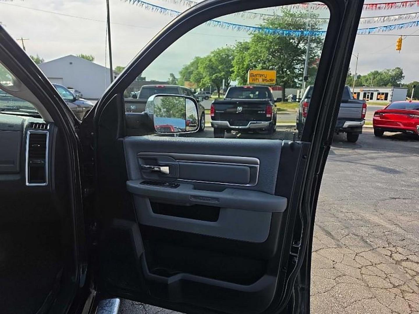 2017 GREEN /BLACK RAM 1500 SLT Crew Cab SWB 4WD (1C6RR7LT4HS) with an 5.7L V8 OHV 16V engine, 8A transmission, located at 3304 Woodville Road, Northwood, OH, 43619, (419) 210-8019, 41.612694, -83.480743 - Your #1 Destination for Auto Loans and mdash;No Matter Your Credit!At our dealership, we believe everyone deserves the opportunity to drive their dream car and mdash;whether you have good credit, bad credit, or no credit at all. With a wide selection of hundreds of cars, trucks, and SUVs, you'll fin - Photo#15