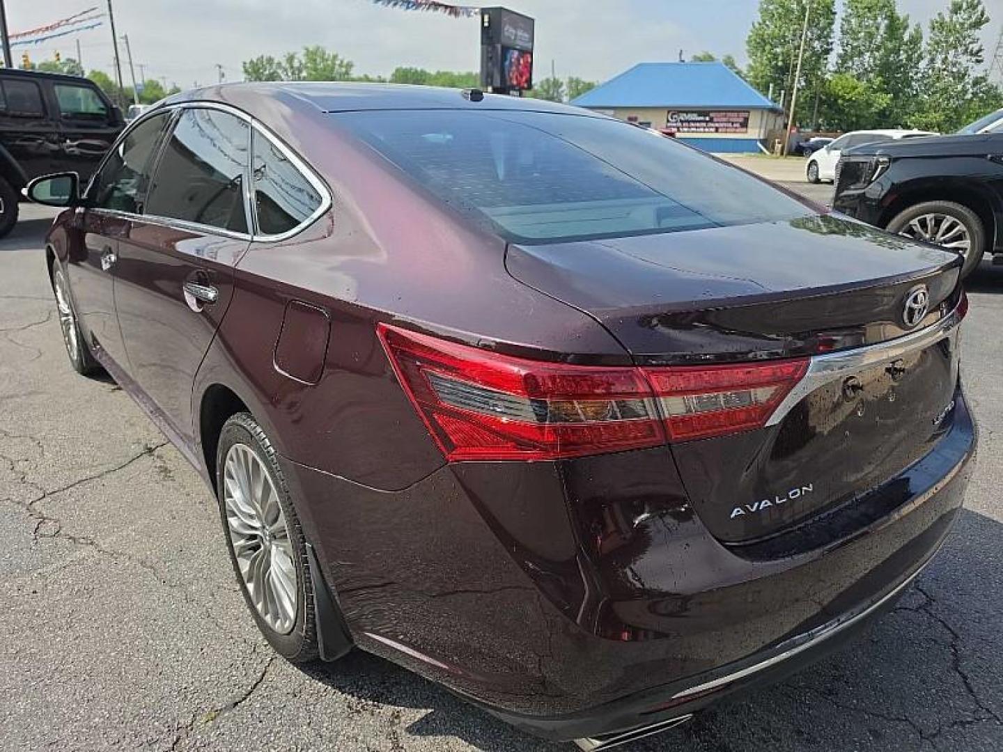 2017 MAROON /TAN Toyota Avalon XLE (4T1BK1EB4HU) with an 3.5L V6 DOHC 24V engine, 6A transmission, located at 3304 Woodville Road, Northwood, OH, 43619, (419) 210-8019, 41.612694, -83.480743 - Your #1 Destination for Auto Loans and mdash;No Matter Your Credit!At our dealership, we believe everyone deserves the opportunity to drive their dream car and mdash;whether you have good credit, bad credit, or no credit at all. With a wide selection of hundreds of cars, trucks, and SUVs, you'll fin - Photo#2