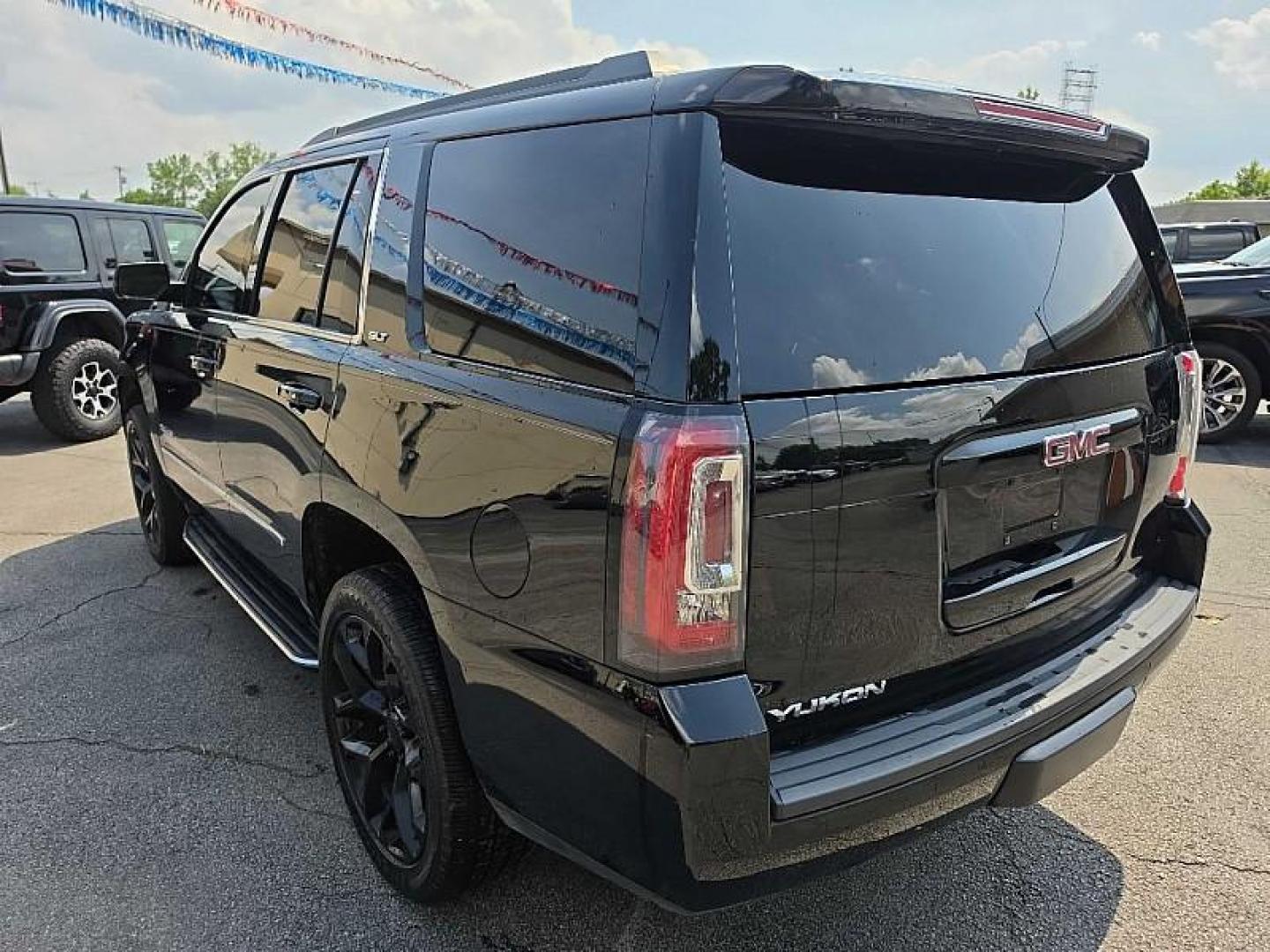 2018 BLACK /BLACK GMC Yukon SLT 4WD (1GKS2BKCXJR) with an 5.3L V8 OHV 16V FFV engine, 6A transmission, located at 3304 Woodville Road, Northwood, OH, 43619, (419) 210-8019, 41.612694, -83.480743 - Your #1 Destination for Auto Loans and mdash;No Matter Your Credit!At our dealership, we believe everyone deserves the opportunity to drive their dream car and mdash;whether you have good credit, bad credit, or no credit at all. With a wide selection of hundreds of cars, trucks, and SUVs, you'll fin - Photo#2