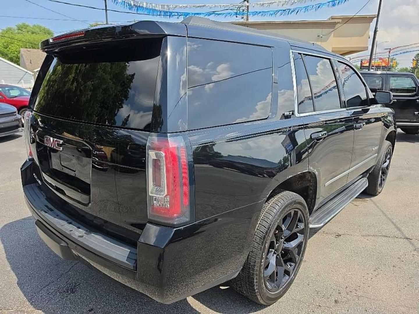 2018 BLACK /BLACK GMC Yukon SLT 4WD (1GKS2BKCXJR) with an 5.3L V8 OHV 16V FFV engine, 6A transmission, located at 3304 Woodville Road, Northwood, OH, 43619, (419) 210-8019, 41.612694, -83.480743 - Your #1 Destination for Auto Loans and mdash;No Matter Your Credit!At our dealership, we believe everyone deserves the opportunity to drive their dream car and mdash;whether you have good credit, bad credit, or no credit at all. With a wide selection of hundreds of cars, trucks, and SUVs, you'll fin - Photo#4
