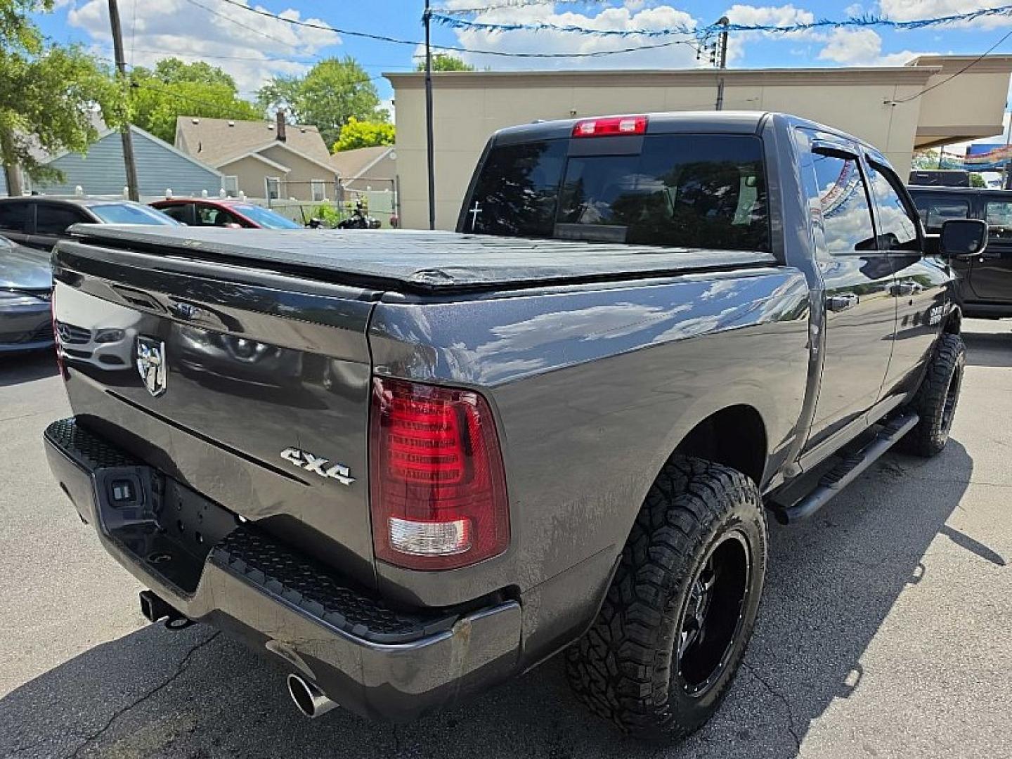 2016 GRAY /BLACK RAM 1500 Sport Crew Cab SWB 4WD (1C6RR7MT8GS) with an 5.7L V8 OHV 16V engine, 6A transmission, located at 3304 Woodville Road, Northwood, OH, 43619, (419) 210-8019, 41.612694, -83.480743 - Your #1 Destination for Auto Loans and mdash;No Matter Your Credit!At our dealership, we believe everyone deserves the opportunity to drive their dream car and mdash;whether you have good credit, bad credit, or no credit at all. With a wide selection of hundreds of cars, trucks, and SUVs, you'll fin- Photo#0