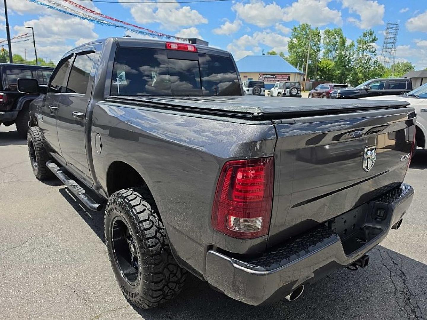 2016 GRAY /BLACK RAM 1500 Sport Crew Cab SWB 4WD (1C6RR7MT8GS) with an 5.7L V8 OHV 16V engine, 6A transmission, located at 3304 Woodville Road, Northwood, OH, 43619, (419) 210-8019, 41.612694, -83.480743 - Your #1 Destination for Auto Loans and mdash;No Matter Your Credit!At our dealership, we believe everyone deserves the opportunity to drive their dream car and mdash;whether you have good credit, bad credit, or no credit at all. With a wide selection of hundreds of cars, trucks, and SUVs, you'll fin- Photo#1