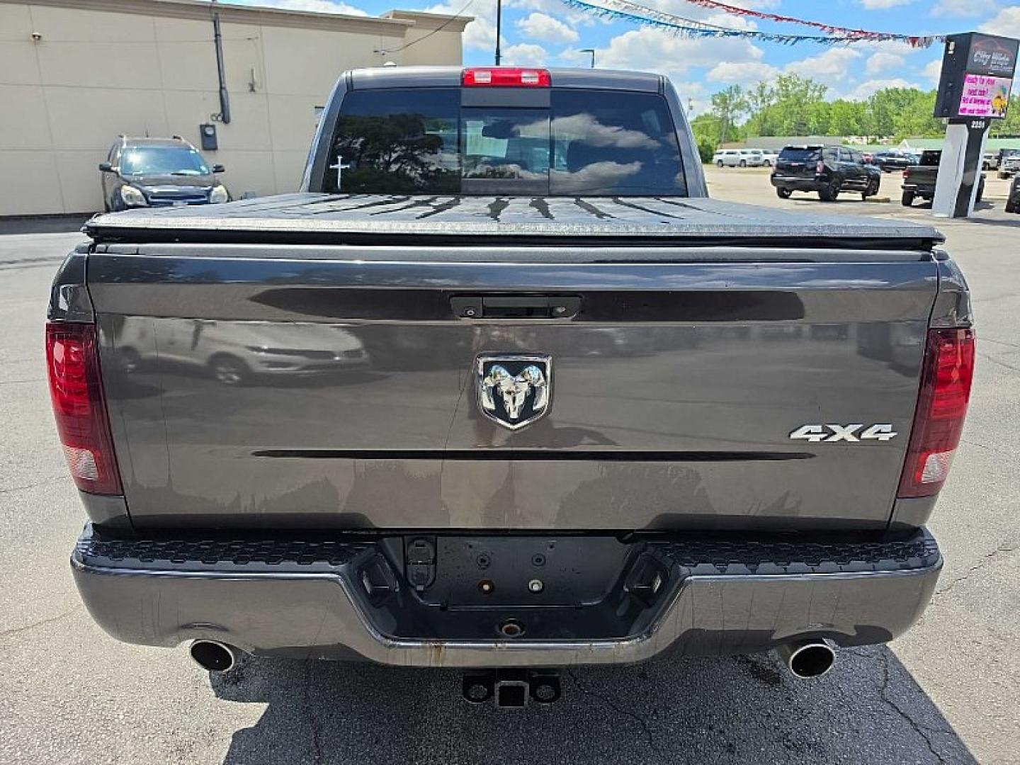 2016 GRAY /BLACK RAM 1500 Sport Crew Cab SWB 4WD (1C6RR7MT8GS) with an 5.7L V8 OHV 16V engine, 6A transmission, located at 3304 Woodville Road, Northwood, OH, 43619, (419) 210-8019, 41.612694, -83.480743 - Your #1 Destination for Auto Loans and mdash;No Matter Your Credit!At our dealership, we believe everyone deserves the opportunity to drive their dream car and mdash;whether you have good credit, bad credit, or no credit at all. With a wide selection of hundreds of cars, trucks, and SUVs, you'll fin- Photo#4