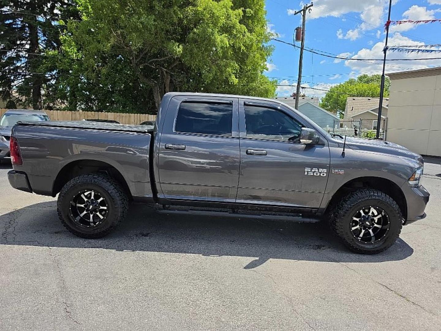 2016 GRAY /BLACK RAM 1500 Sport Crew Cab SWB 4WD (1C6RR7MT8GS) with an 5.7L V8 OHV 16V engine, 6A transmission, located at 3304 Woodville Road, Northwood, OH, 43619, (419) 210-8019, 41.612694, -83.480743 - Your #1 Destination for Auto Loans and mdash;No Matter Your Credit!At our dealership, we believe everyone deserves the opportunity to drive their dream car and mdash;whether you have good credit, bad credit, or no credit at all. With a wide selection of hundreds of cars, trucks, and SUVs, you'll fin- Photo#5